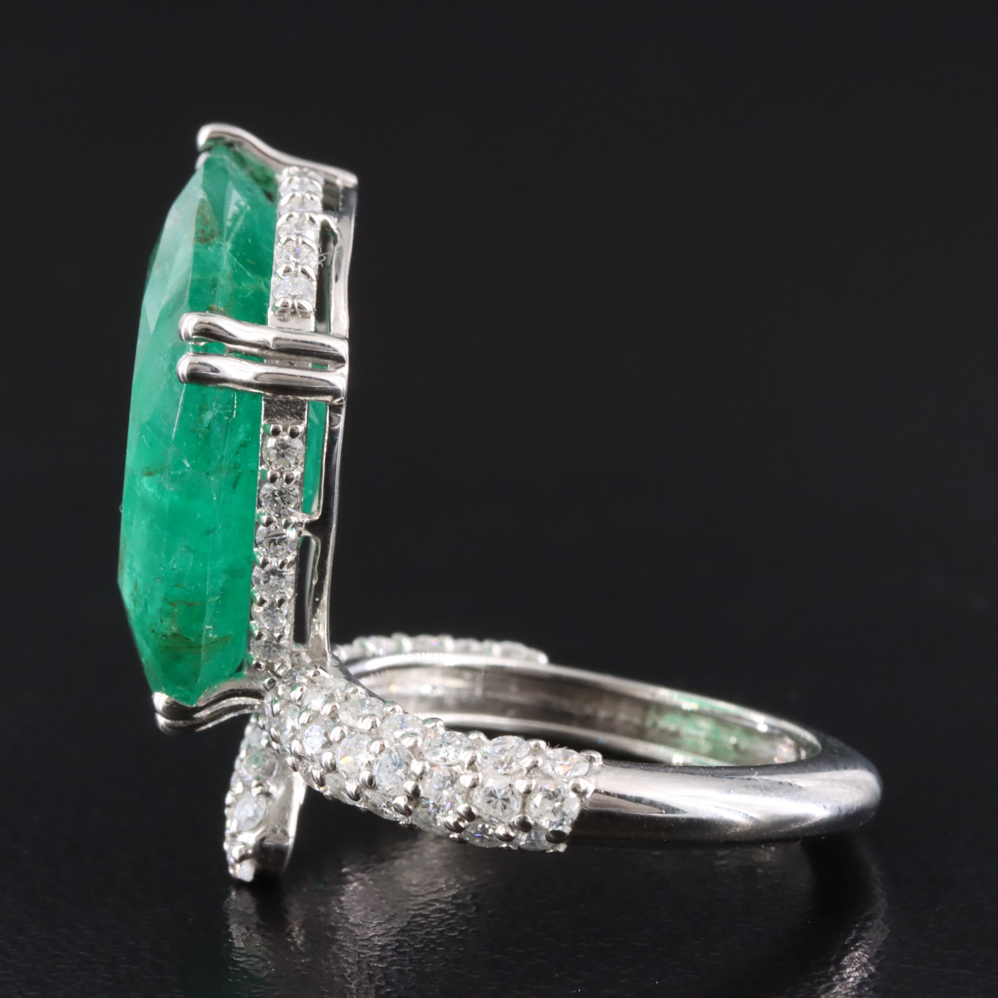Platinum 15.51 CT Emerald and 1.28 CTW Diamond Ring