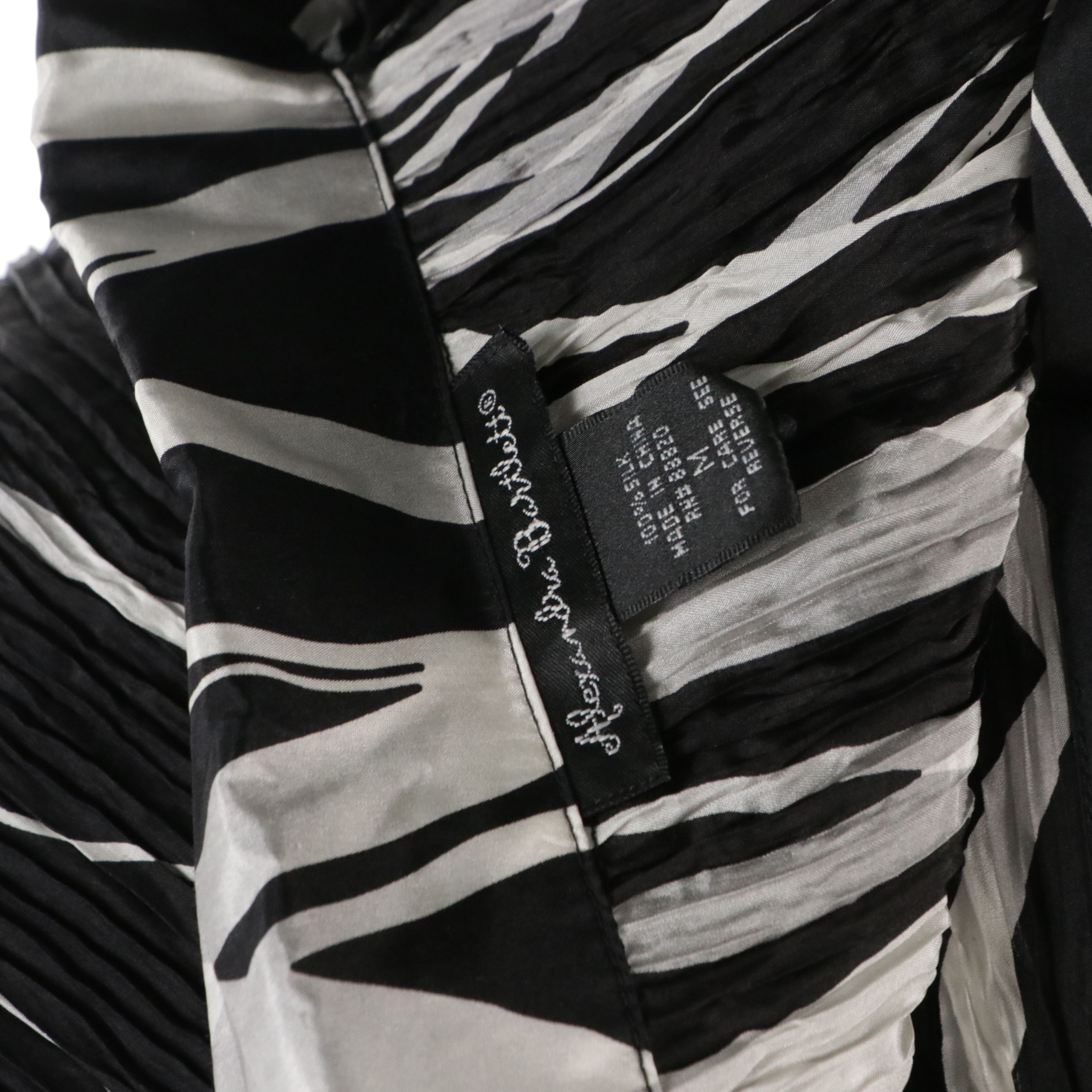 Tibi Peacock Print Silk Dress and Alexandra Bartlett Plissé Silk Button-Up Shirt