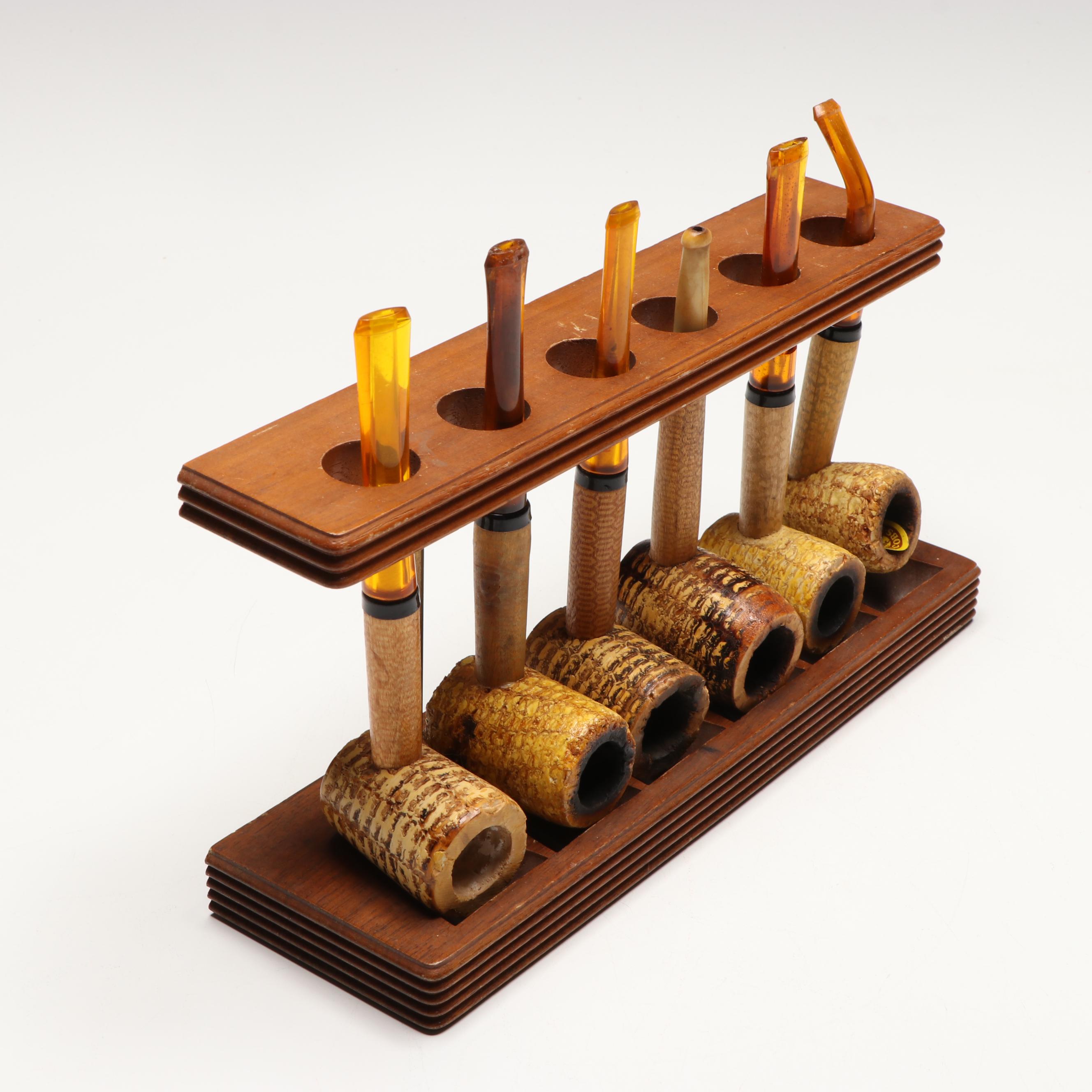 Hirschl & Bendheim and Other Corncob Pipes with Stand
