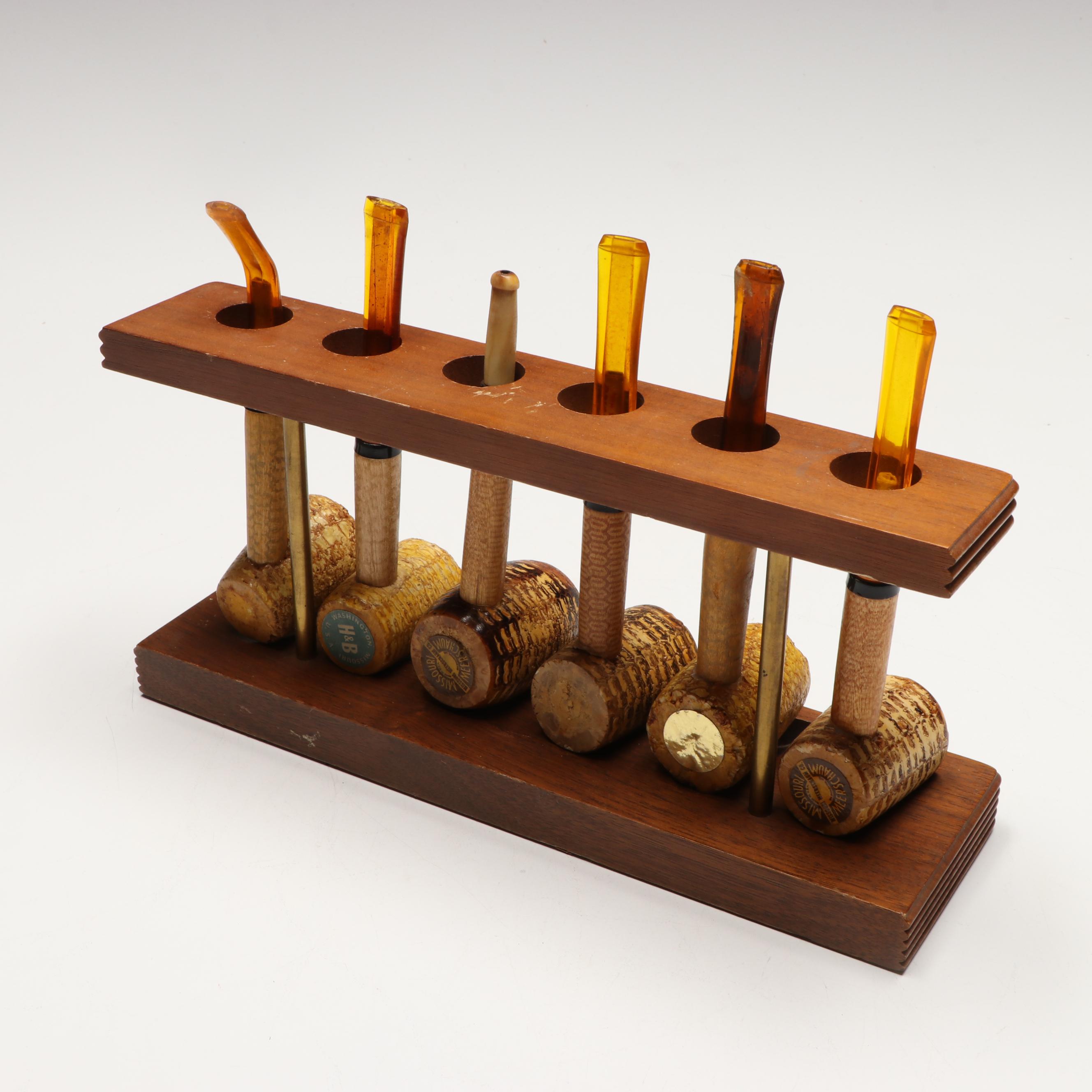 Hirschl & Bendheim and Other Corncob Pipes with Stand