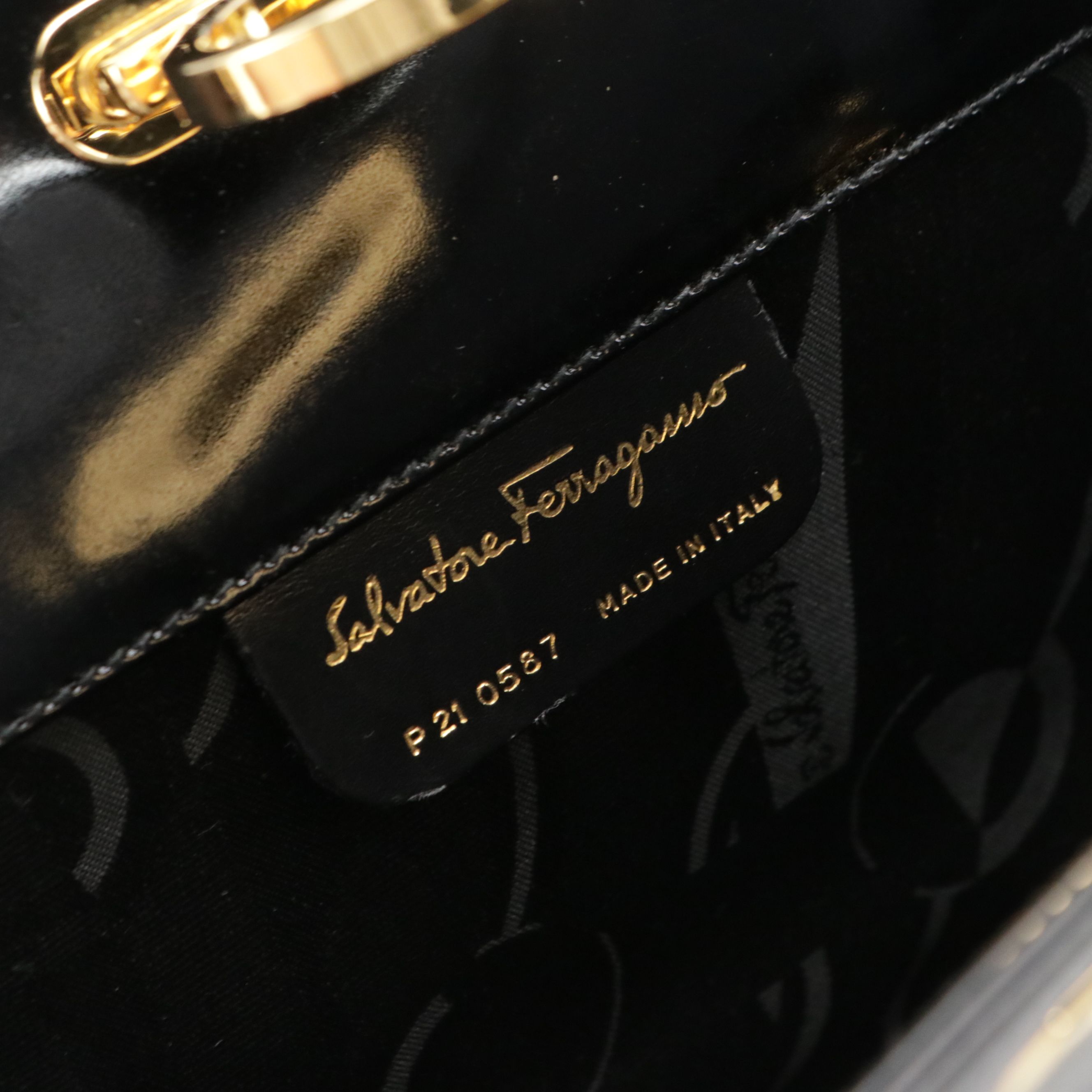 Salvatore Ferragamo Gancini Convertible Clutch in Patent Leather