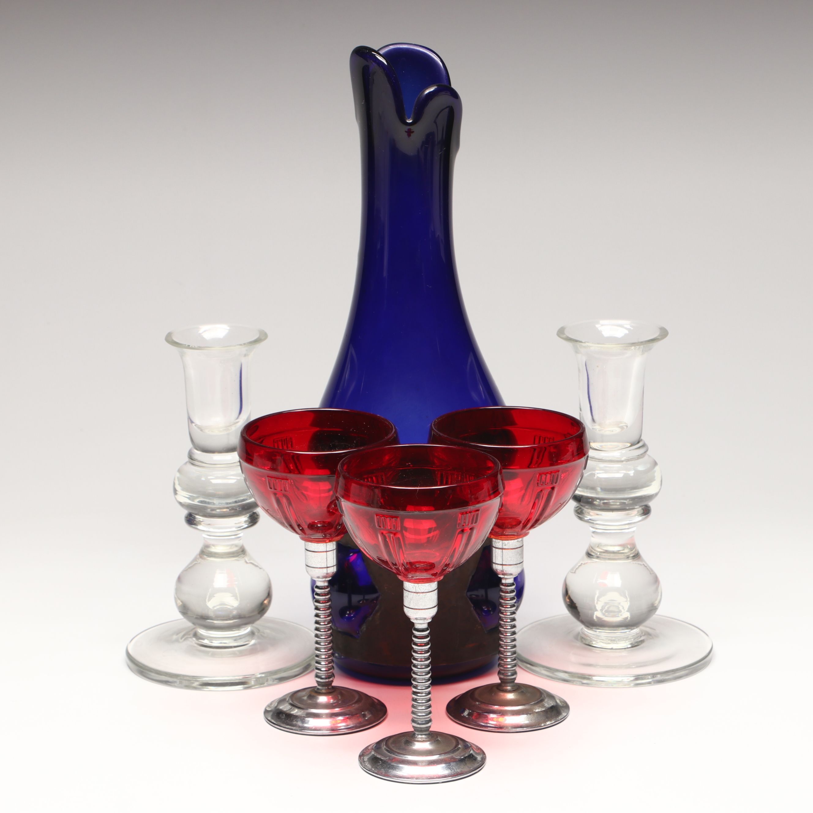 Crystal Candle Holders, Blue Glass Decanter, and Red Glass Stemware