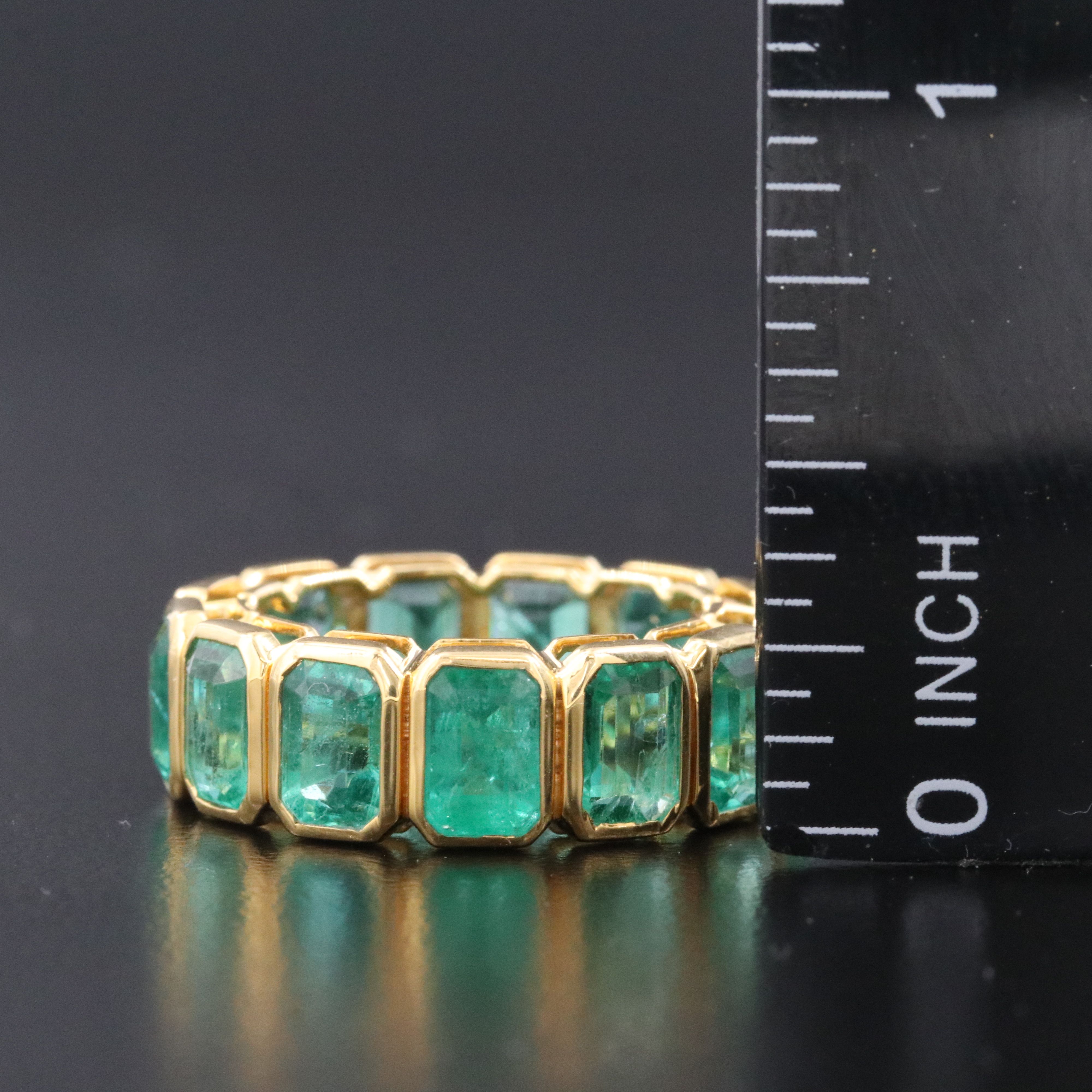 18K 8.07 CTW Emerald Eternity Band