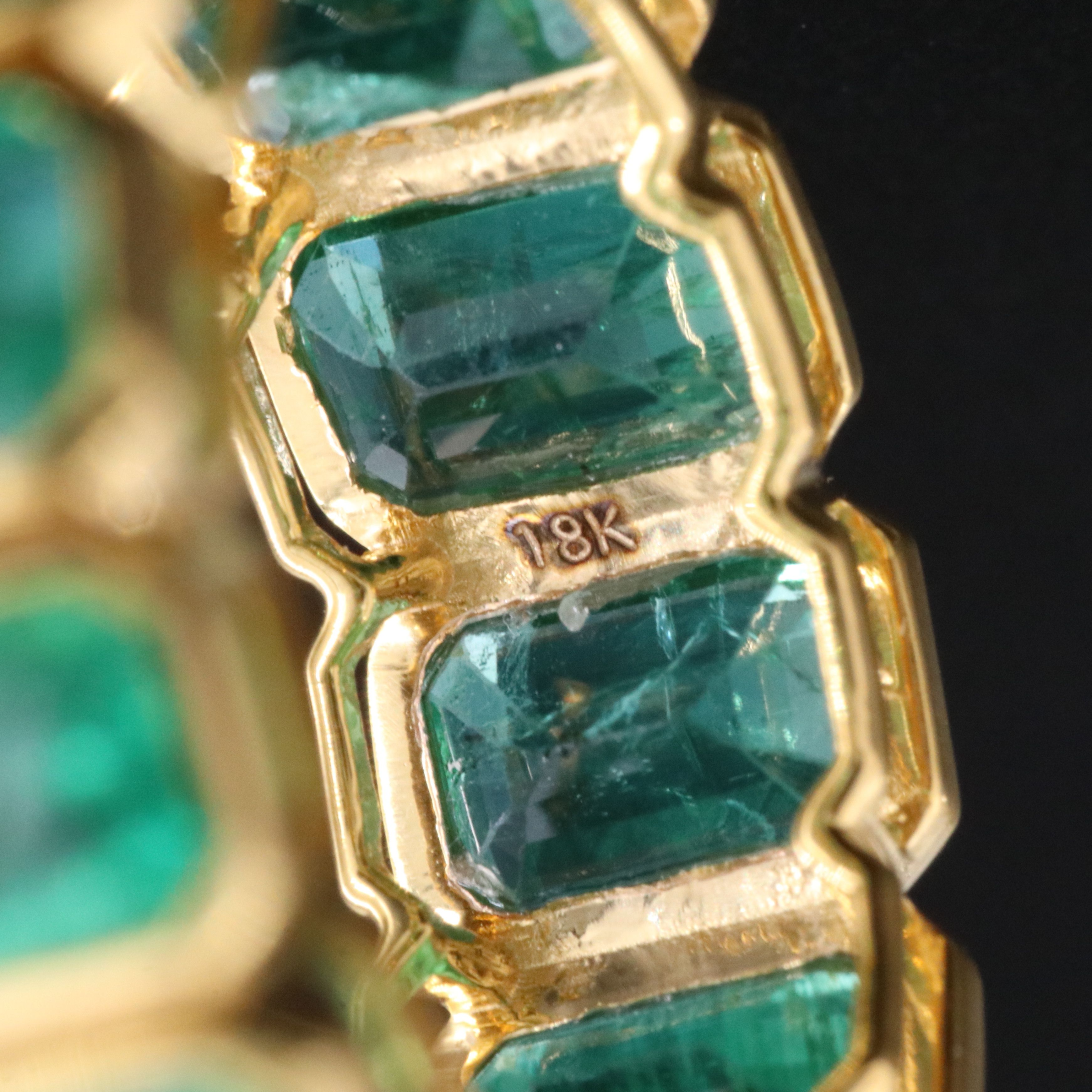 18K 8.07 CTW Emerald Eternity Band