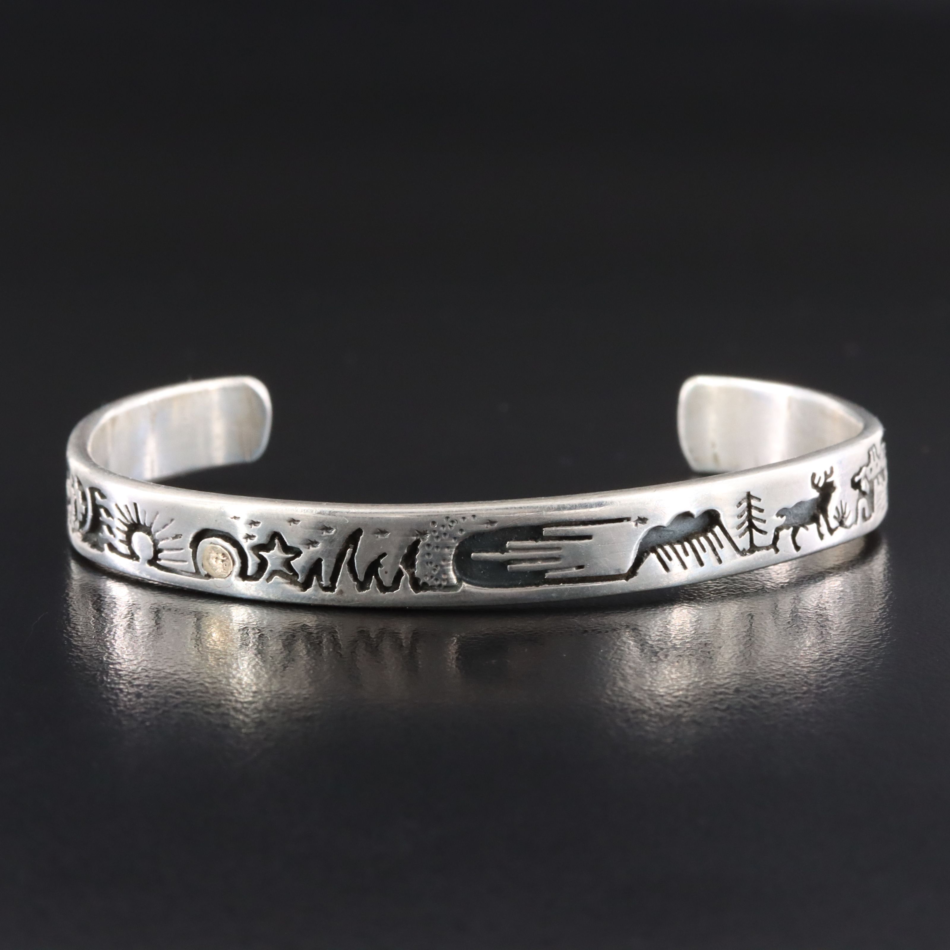 Vidal Aragon Kewa Pueblo (Santo Domingo) Sterling Overlay Storyteller Bracelet