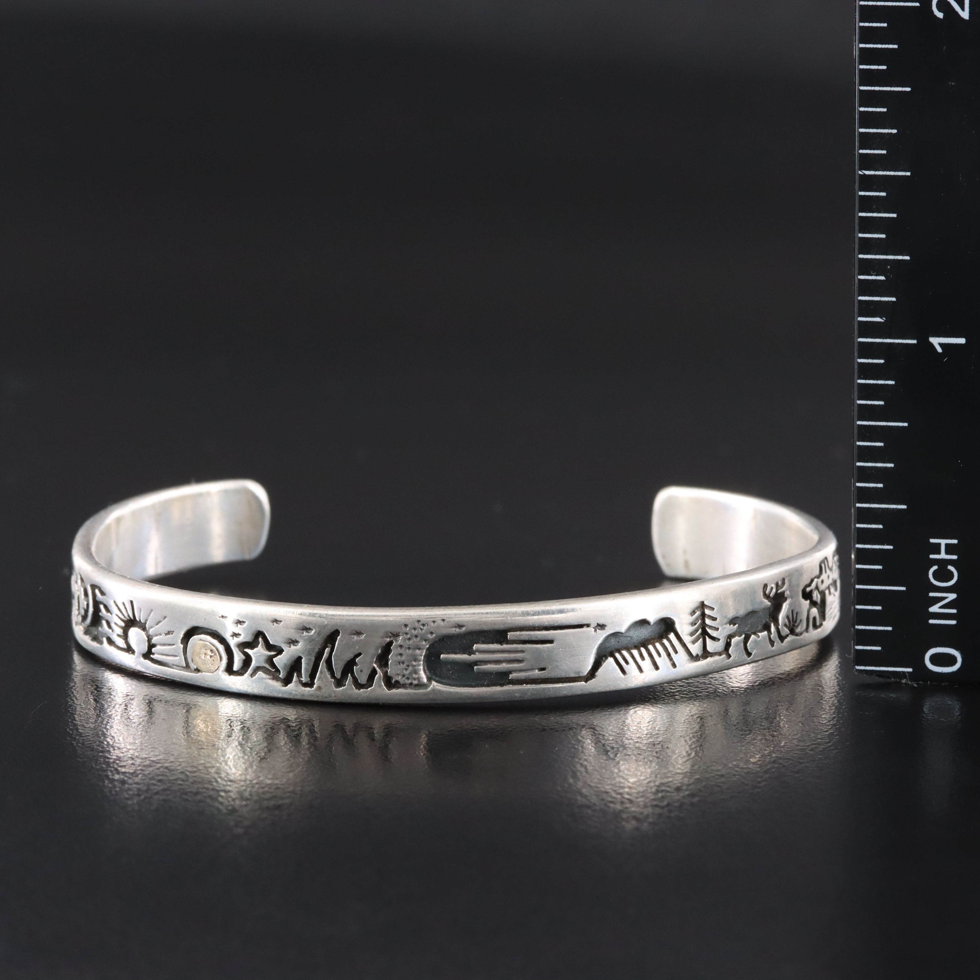 Vidal Aragon Kewa Pueblo (Santo Domingo) Sterling Overlay Storyteller Bracelet