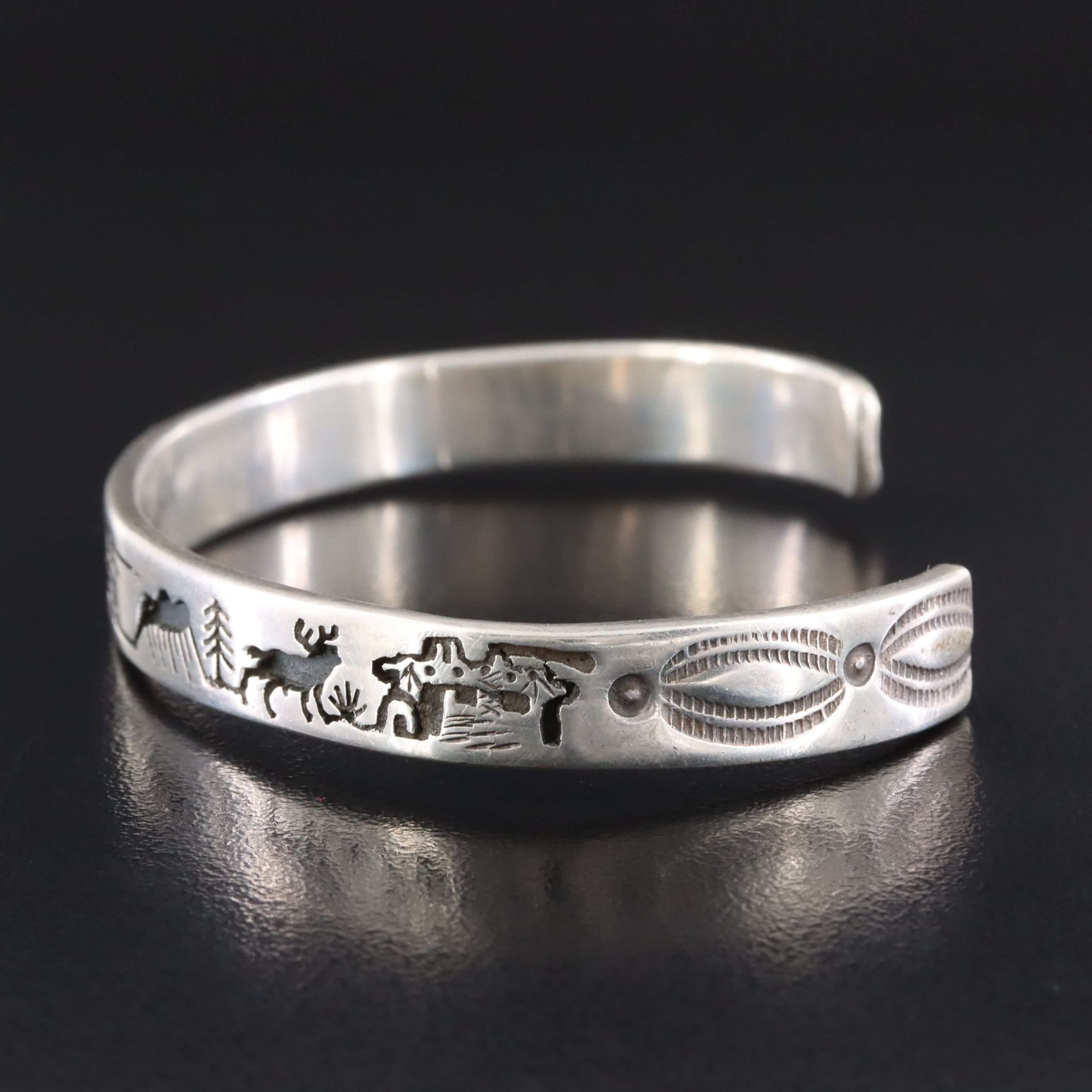 Vidal Aragon Kewa Pueblo (Santo Domingo) Sterling Overlay Storyteller Bracelet