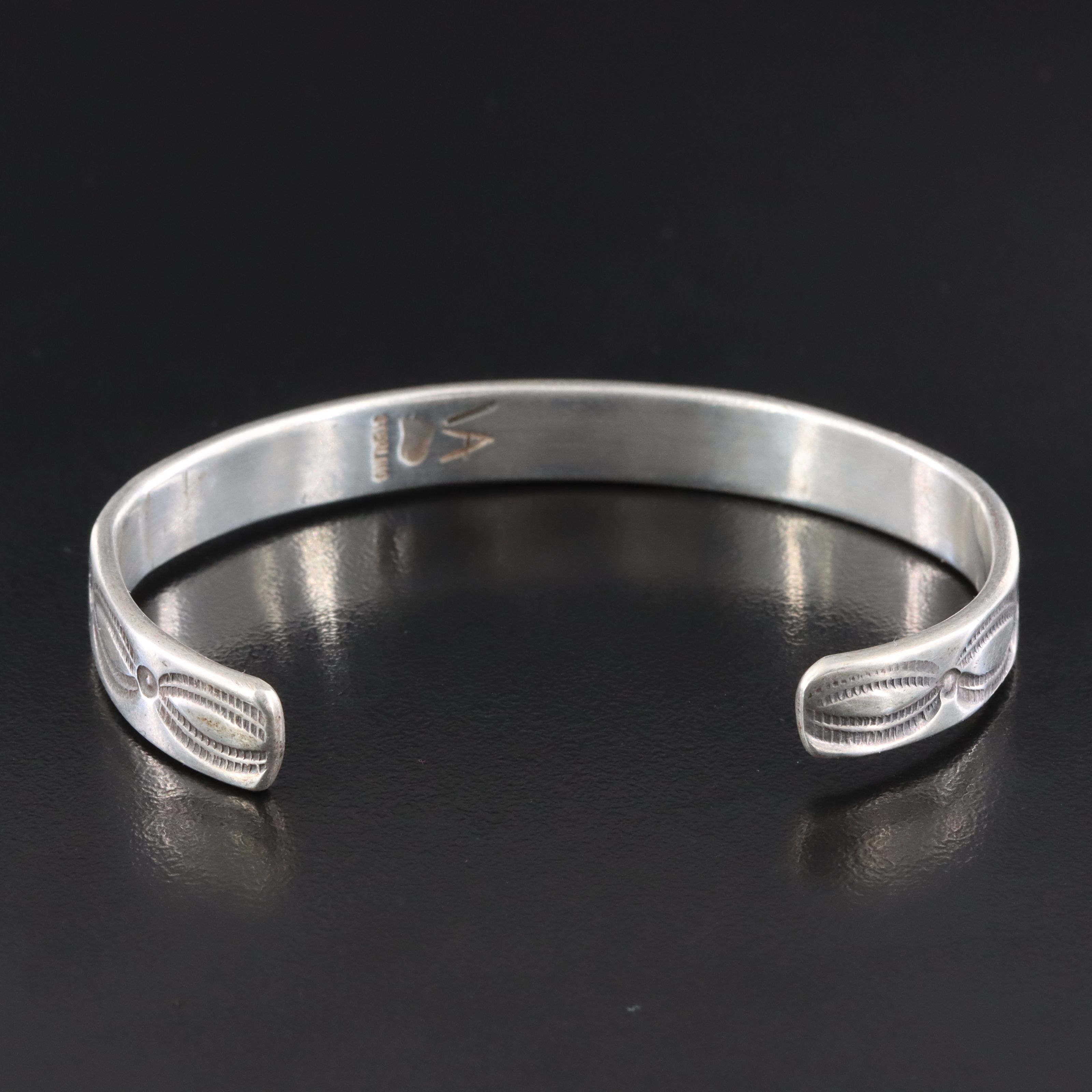 Vidal Aragon Kewa Pueblo (Santo Domingo) Sterling Overlay Storyteller Bracelet