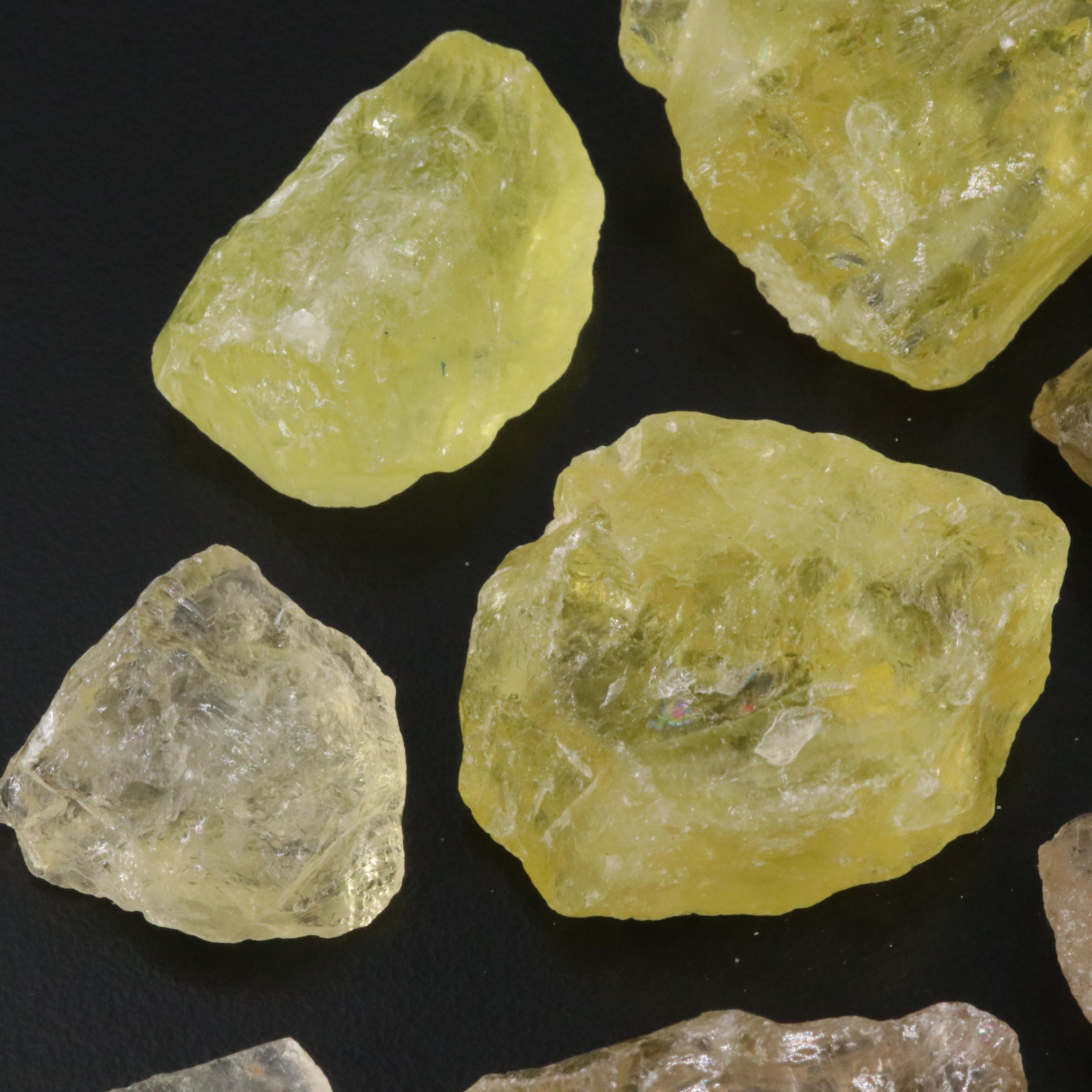 Loose 883.50 CTW Rough Citrine and Smoky Quartz Lot