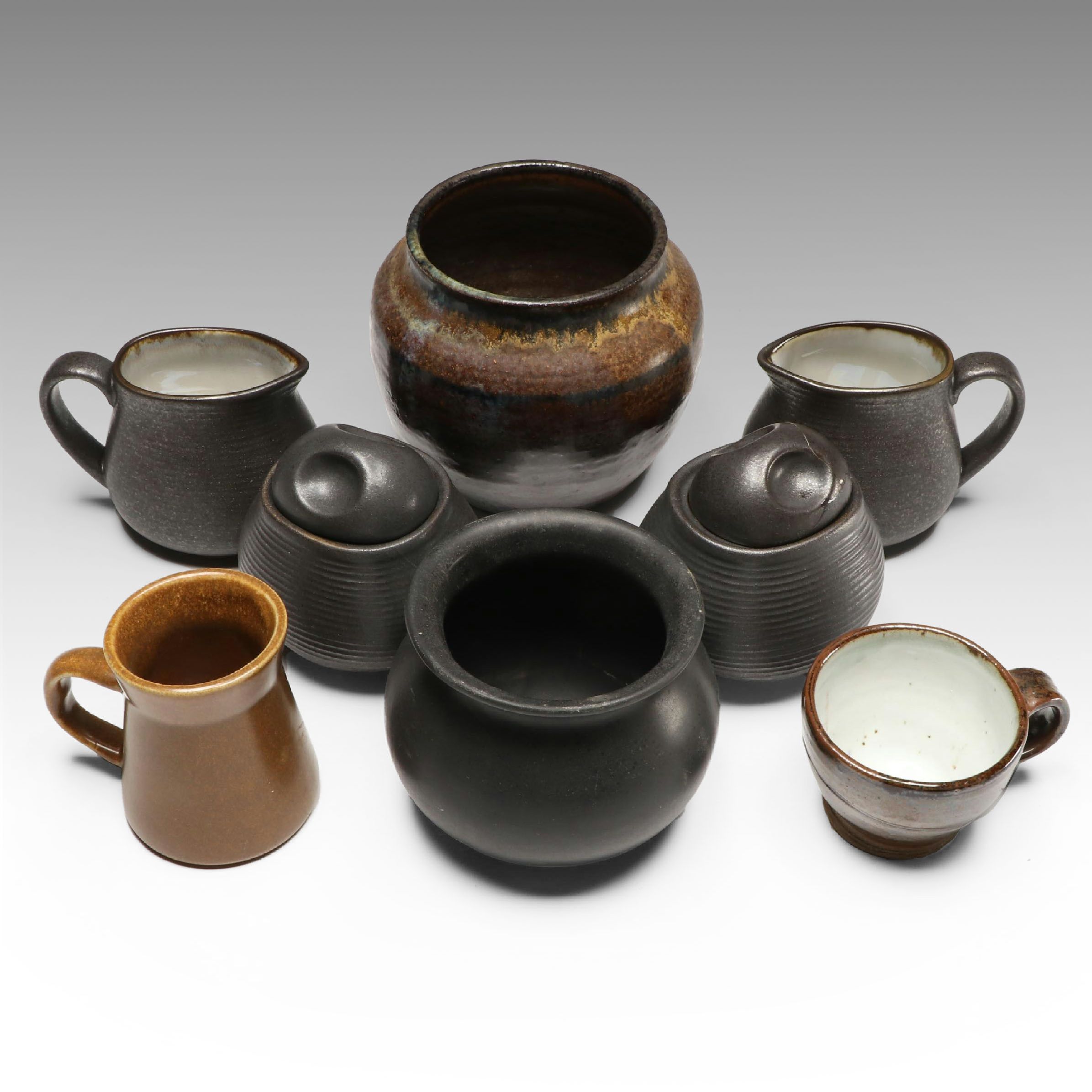 Sango Black Stoneware Dinnerware with More Art Pottery, Late 20th Century