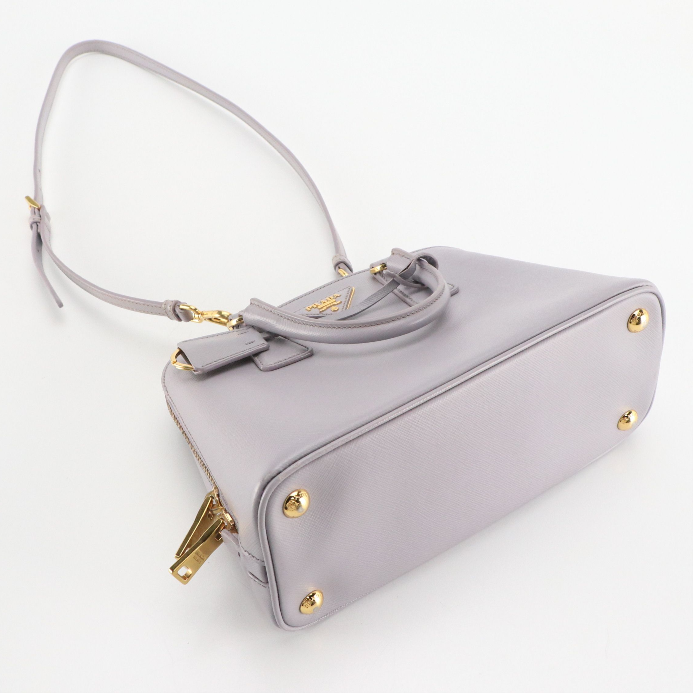 Prada Small Domed Zip Around Two-Way Bag in Lilac Saffiano Leather