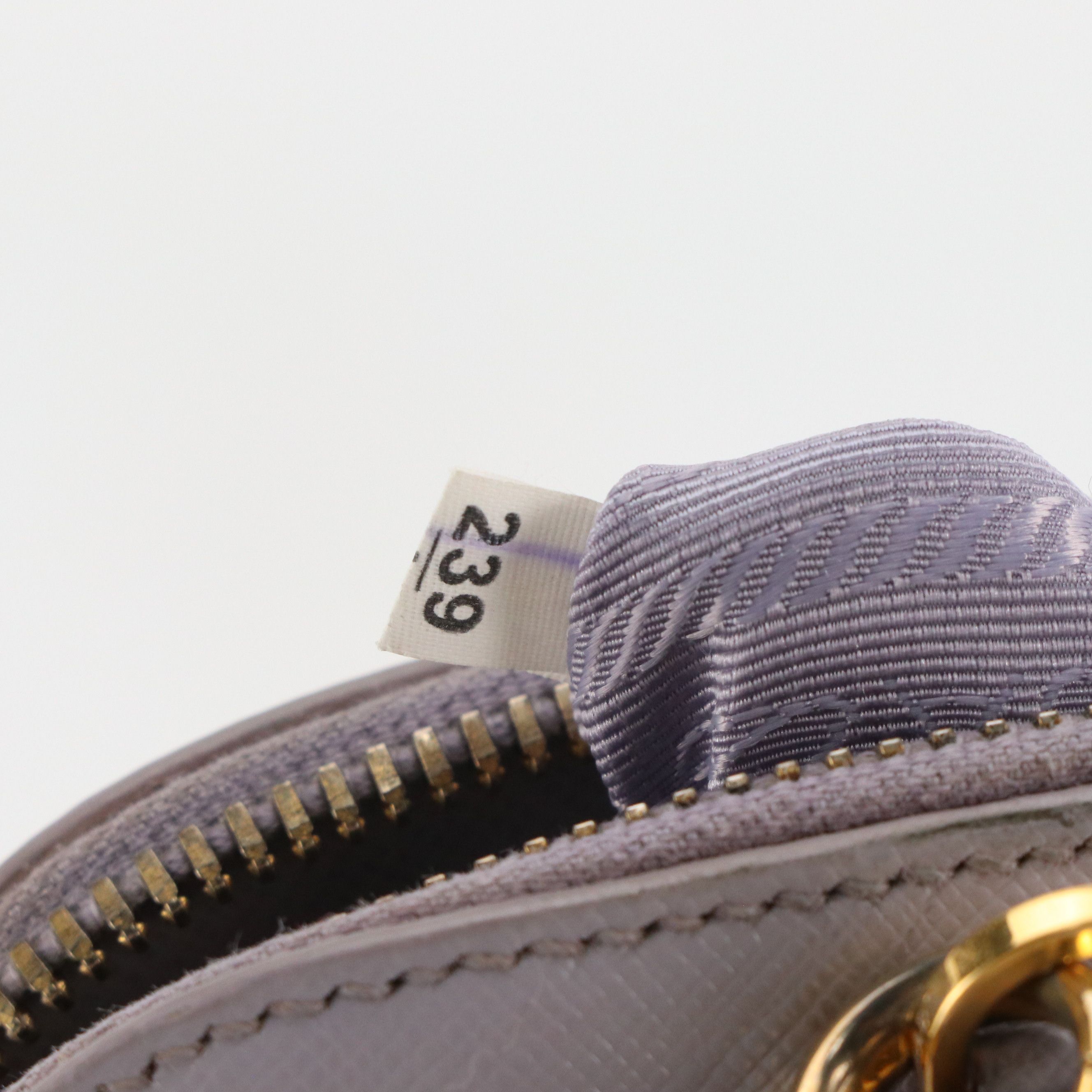 Prada Small Domed Zip Around Two-Way Bag in Lilac Saffiano Leather