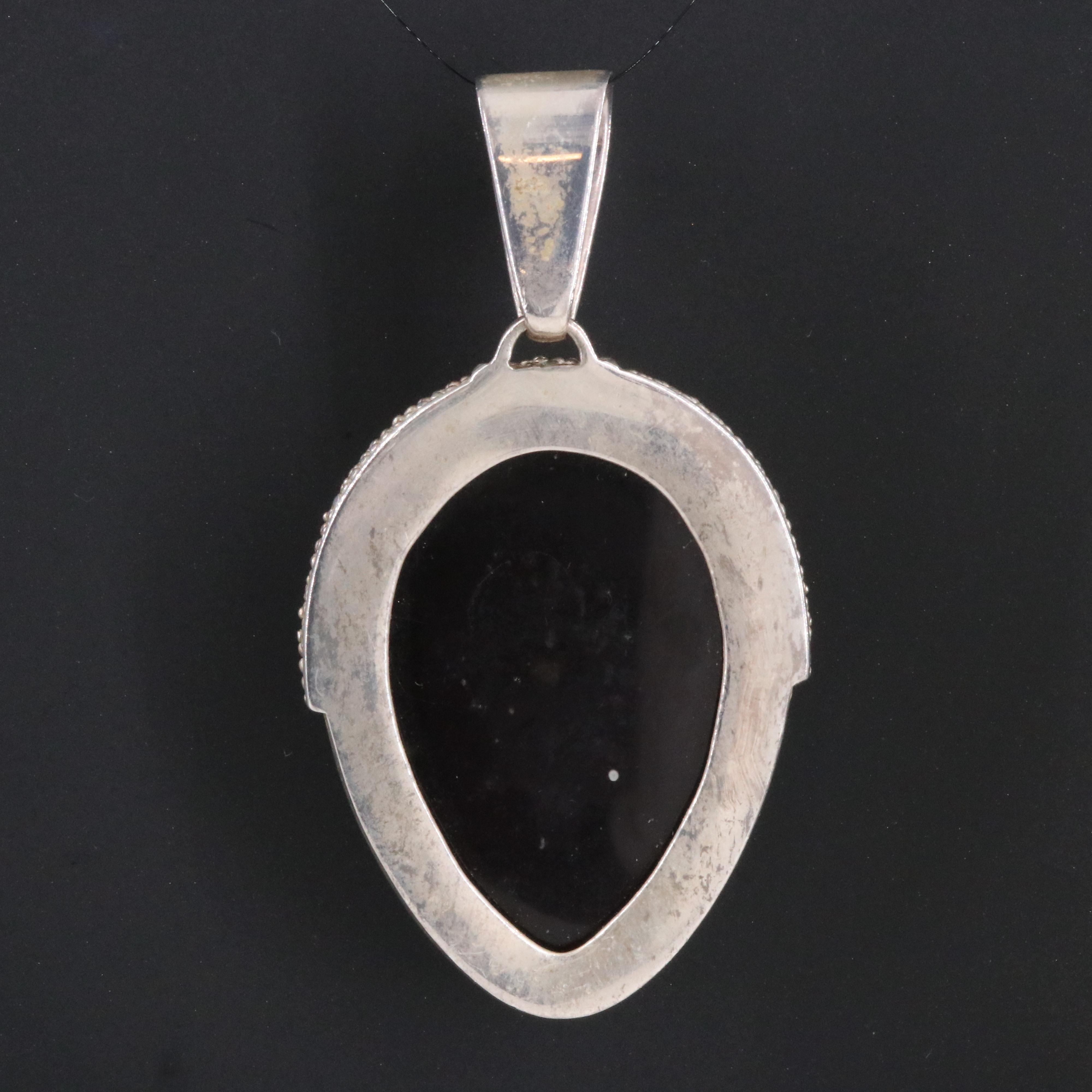 Sajen Sterling Pendant Including Obsidian, Topaz and Apatite