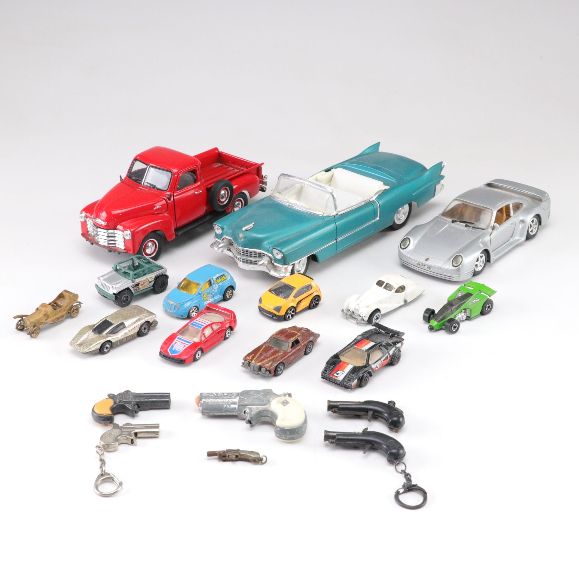 1955 Cadillac Eldorado Model with Other Diecast Car & Gun Toys