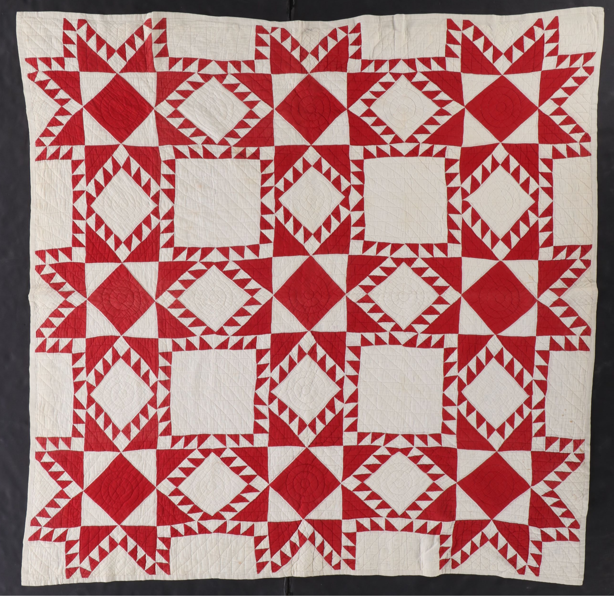 Hand-Pieced "Ohio Star" Cotton Quilt with Floral Needlework Panel