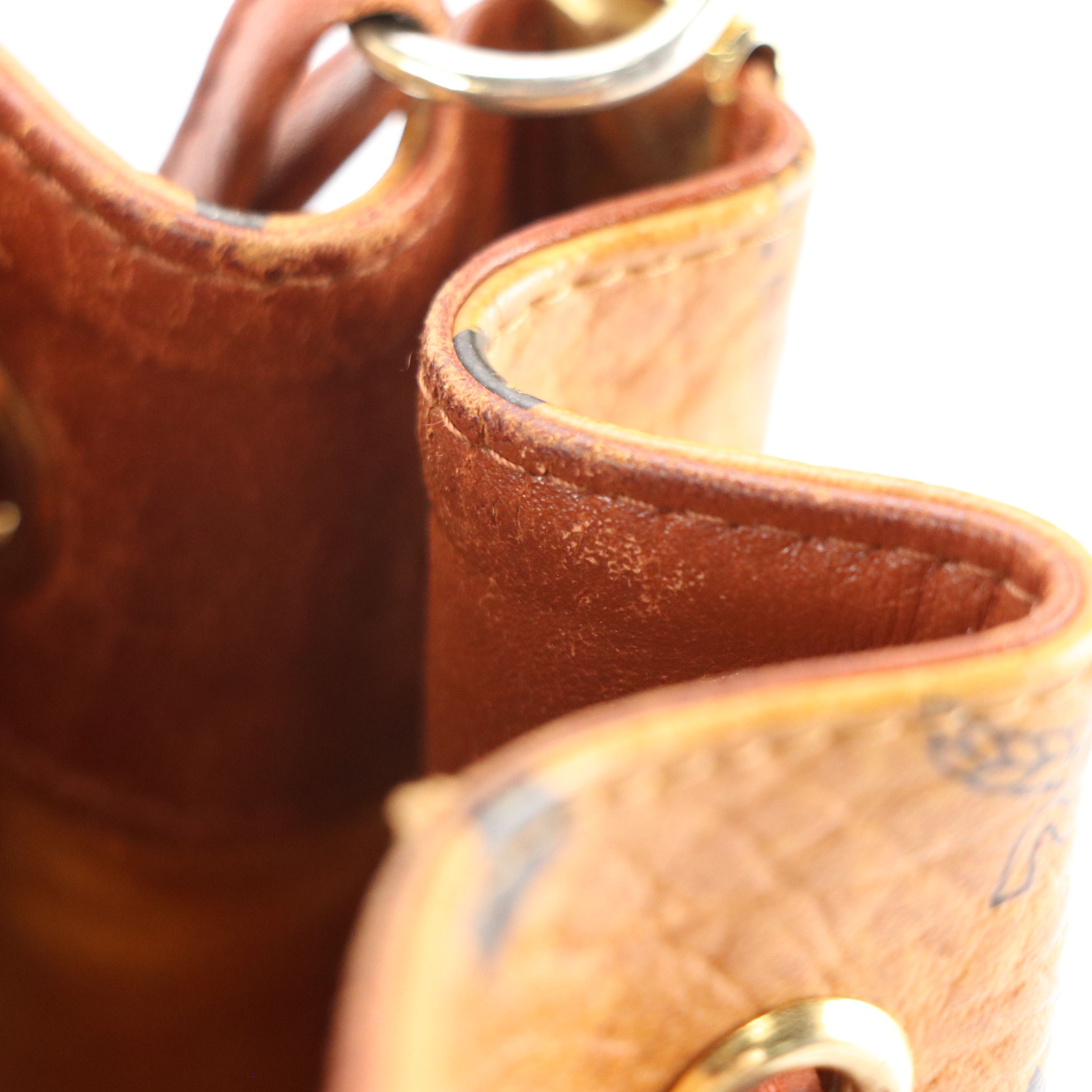 MCM Mini Drawstring Bucket Bag in Cognac Visetos Canvas with Leather Trim