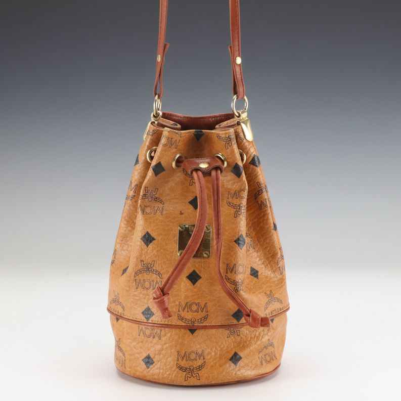 MCM Mini Drawstring Bucket Bag in Cognac Visetos Canvas with Leather Trim