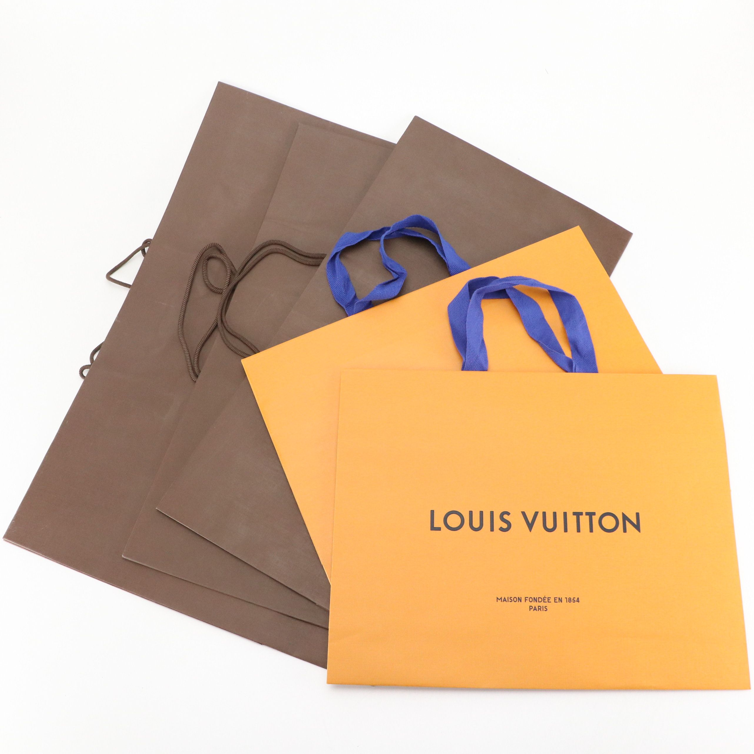 Designer Dust Bags, Boxes and More Featuring Louis Vuitton and Prada
