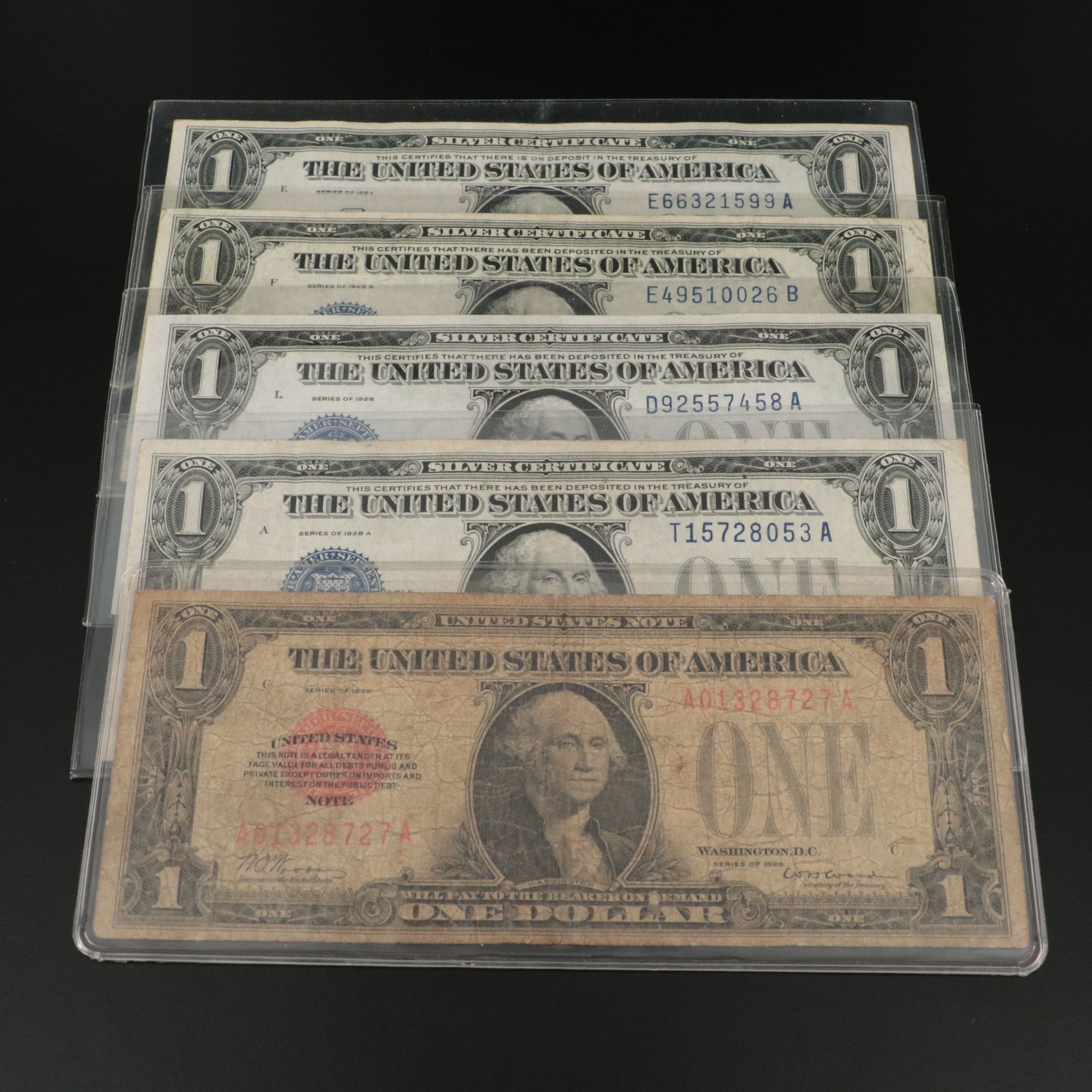 4 One Dollar Funny Back Notes and a 1928 One Dollar Legal Tender Note