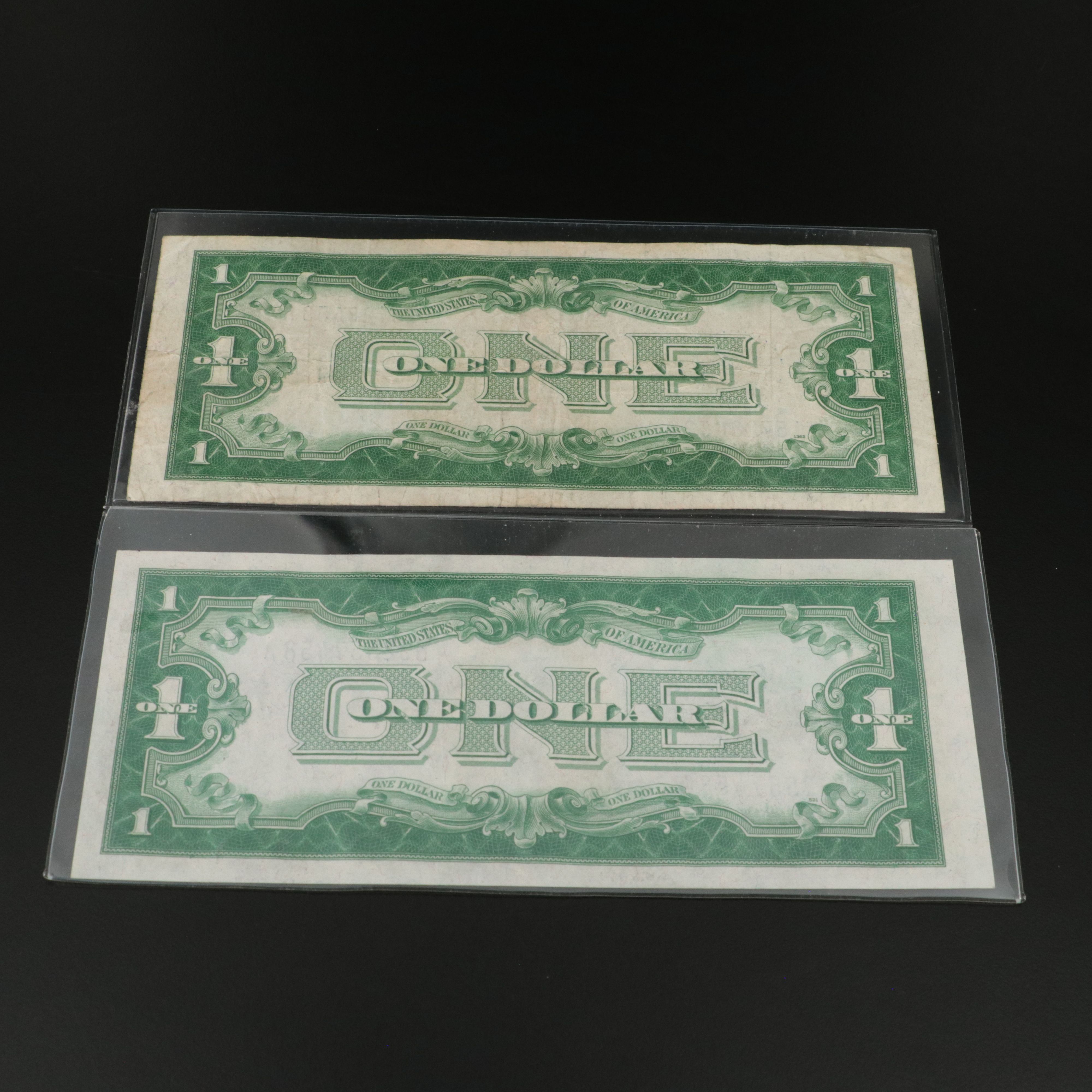 4 One Dollar Funny Back Notes and a 1928 One Dollar Legal Tender Note