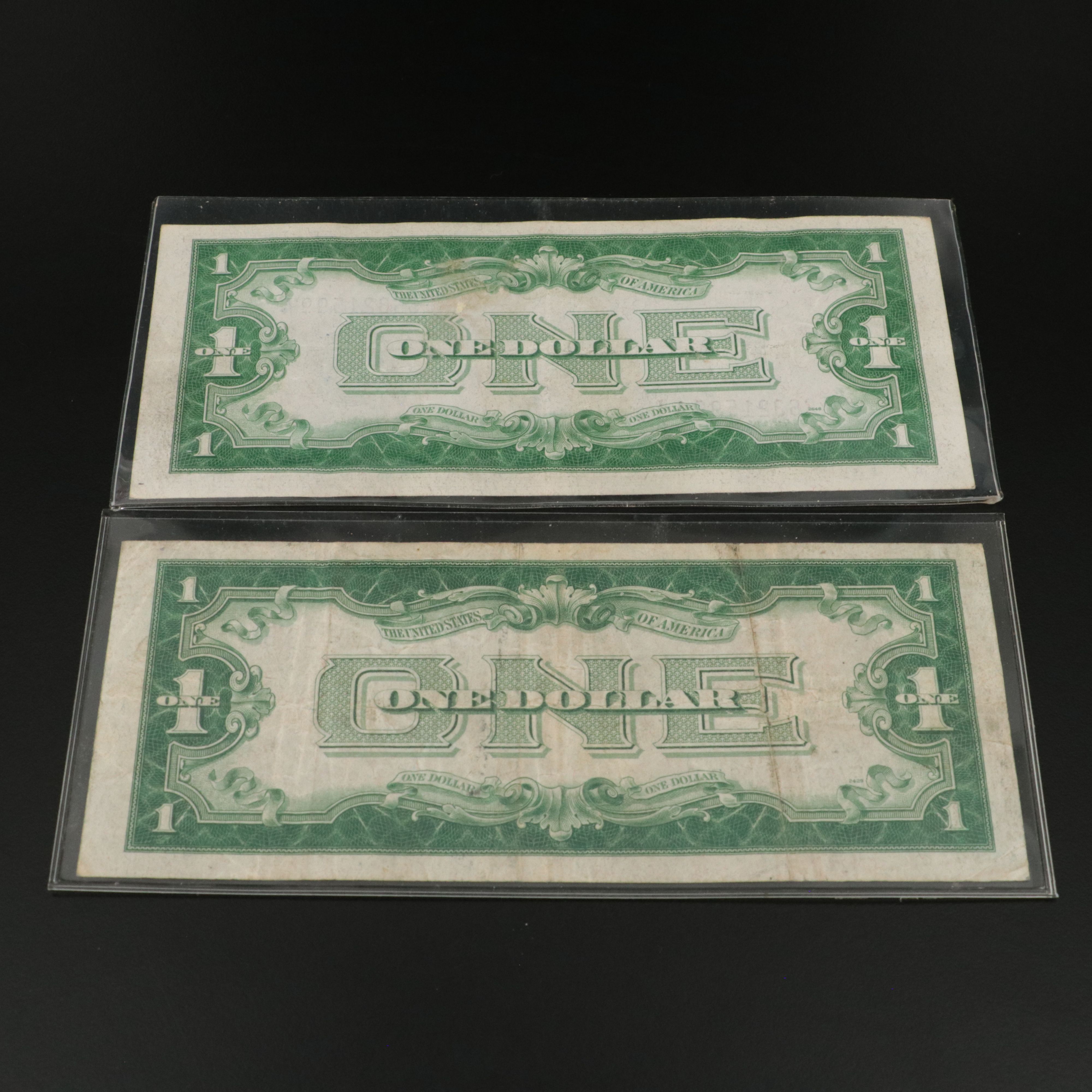 4 One Dollar Funny Back Notes and a 1928 One Dollar Legal Tender Note