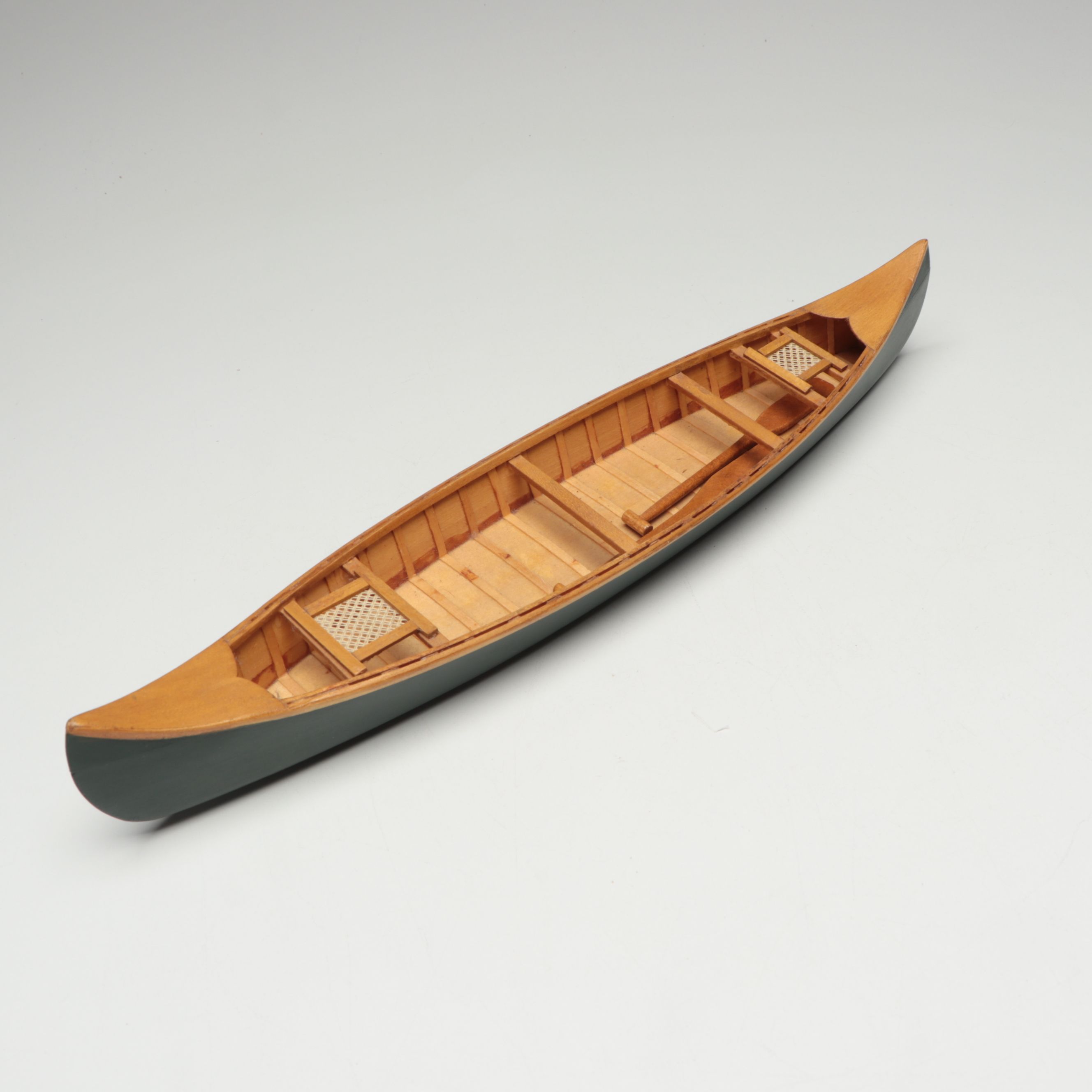 Handcrafted Wooden Canoe and Rowboat Models