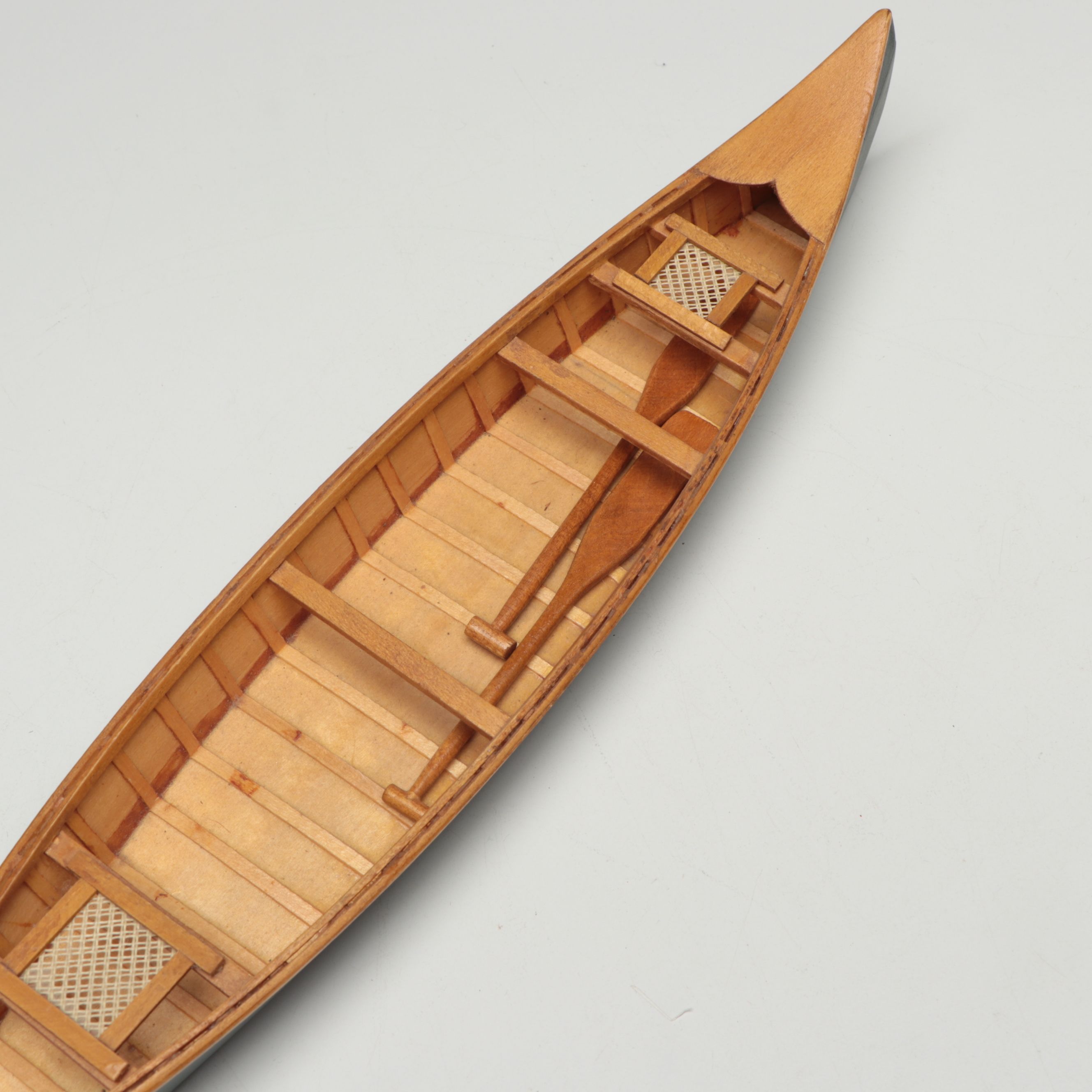 Handcrafted Wooden Canoe and Rowboat Models