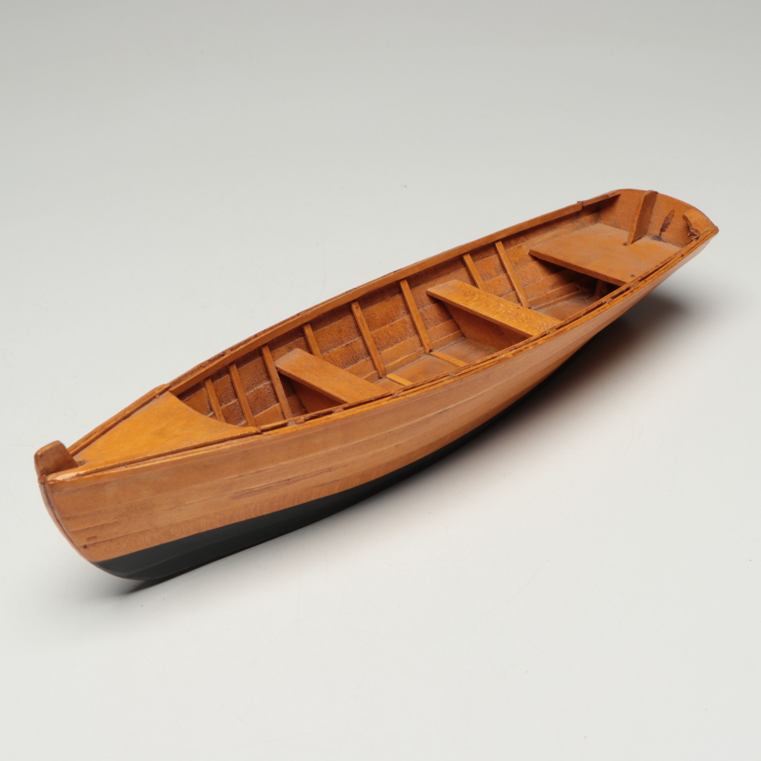 Handcrafted Wooden Canoe and Rowboat Models