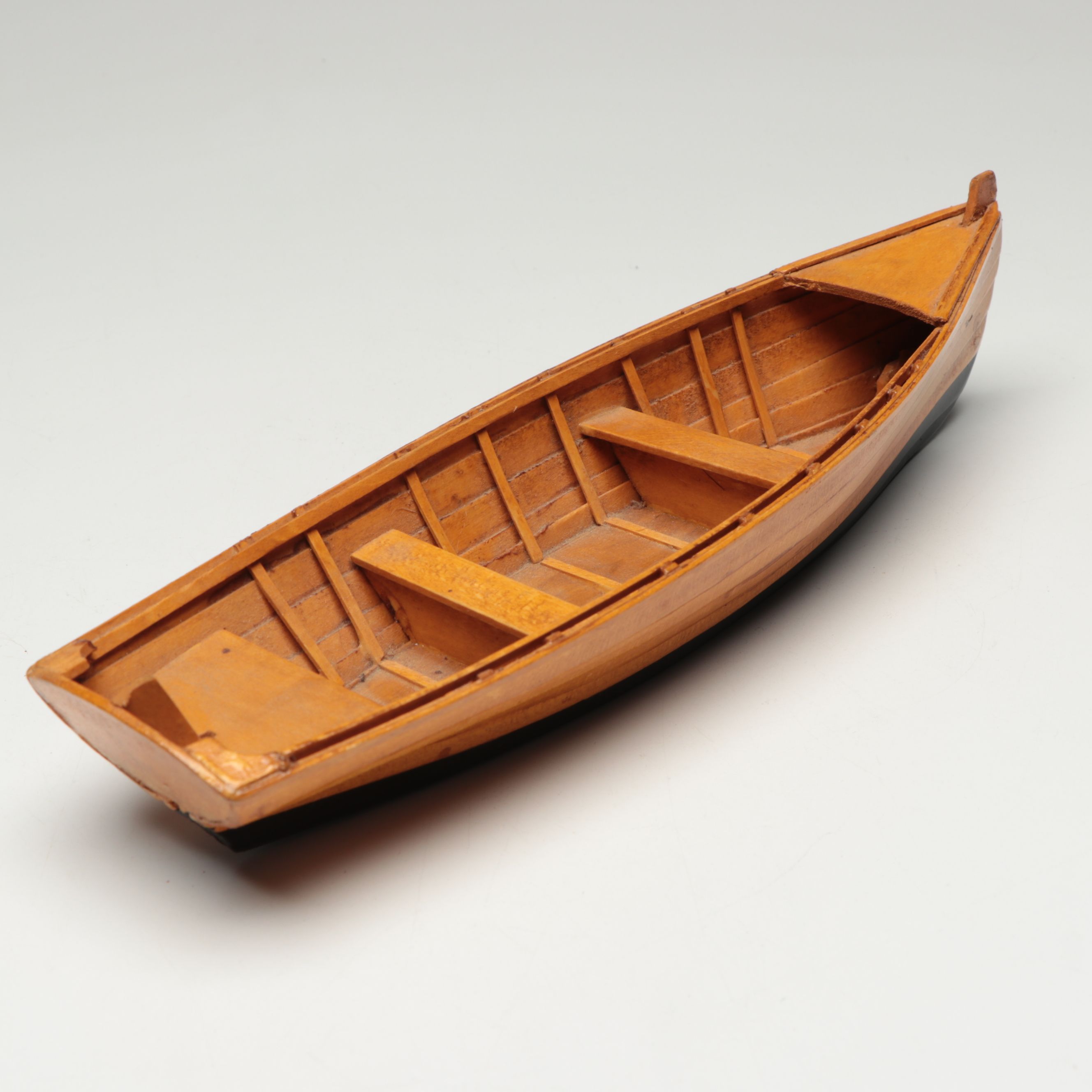 Handcrafted Wooden Canoe and Rowboat Models