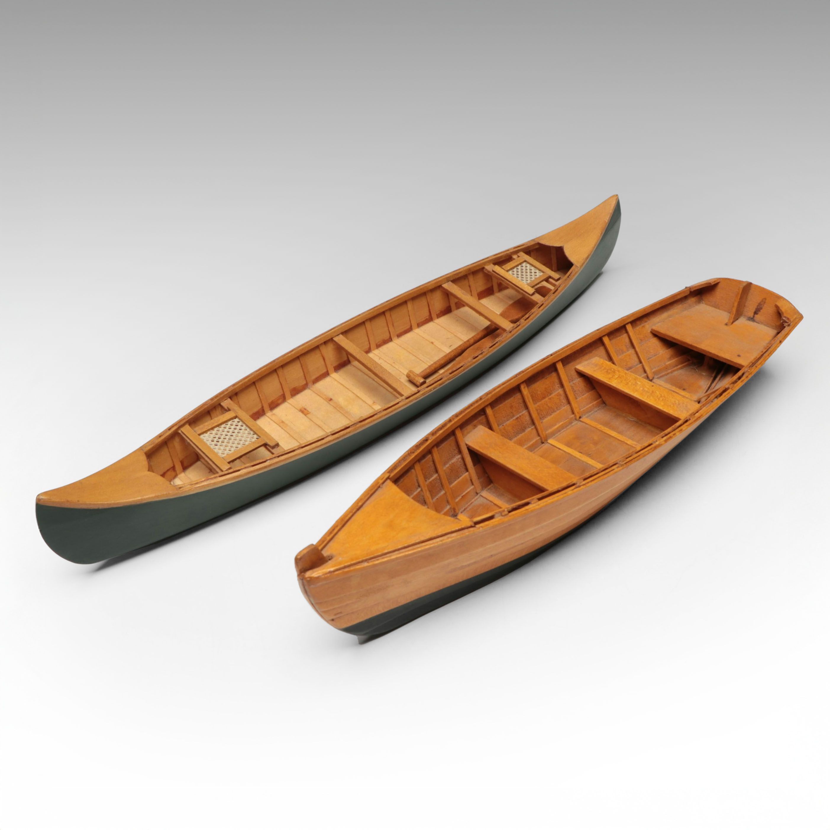 Handcrafted Wooden Canoe and Rowboat Models