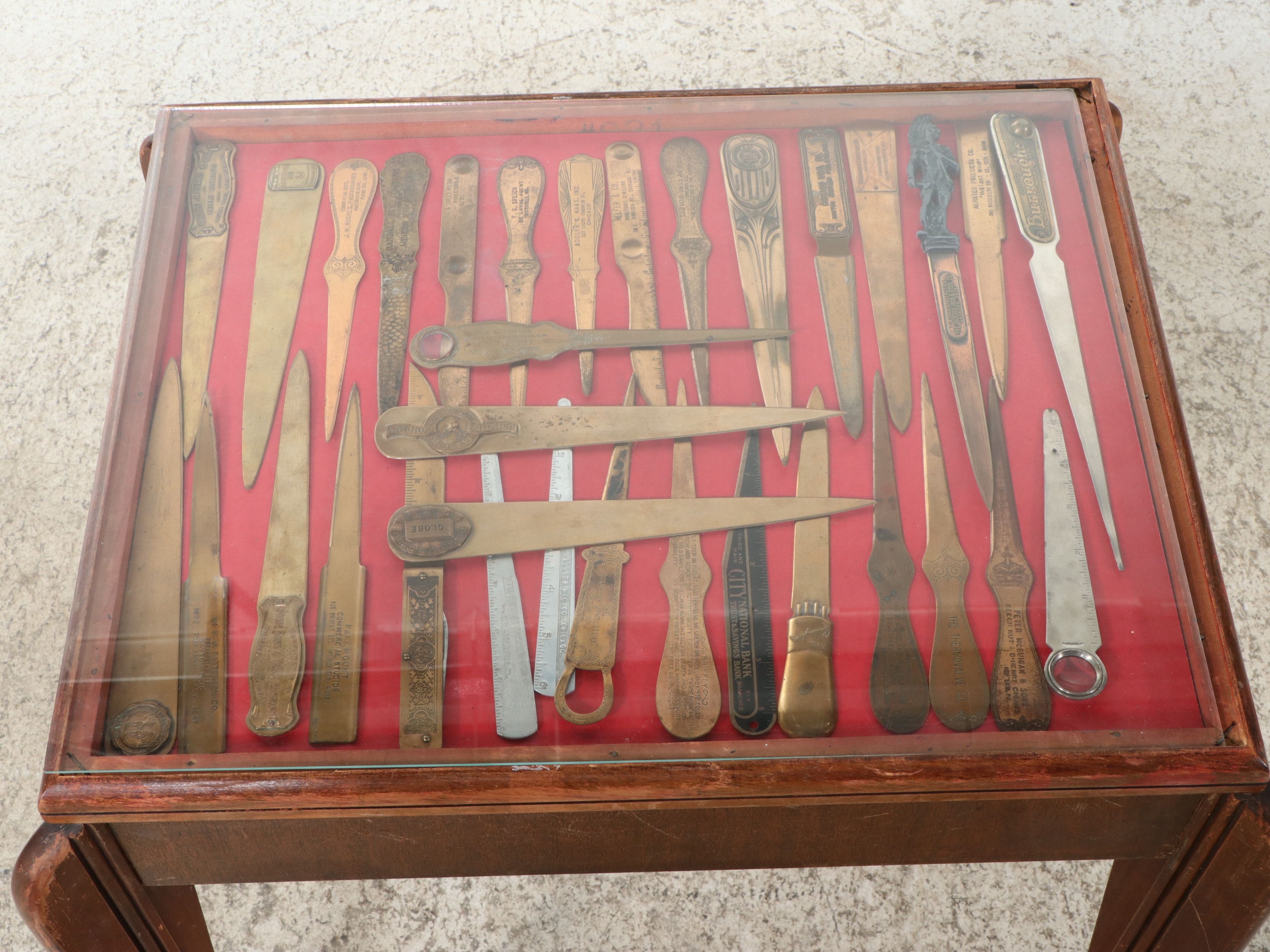 Art Deco Style Display Table Featuring Vintage Letter Opener Collection