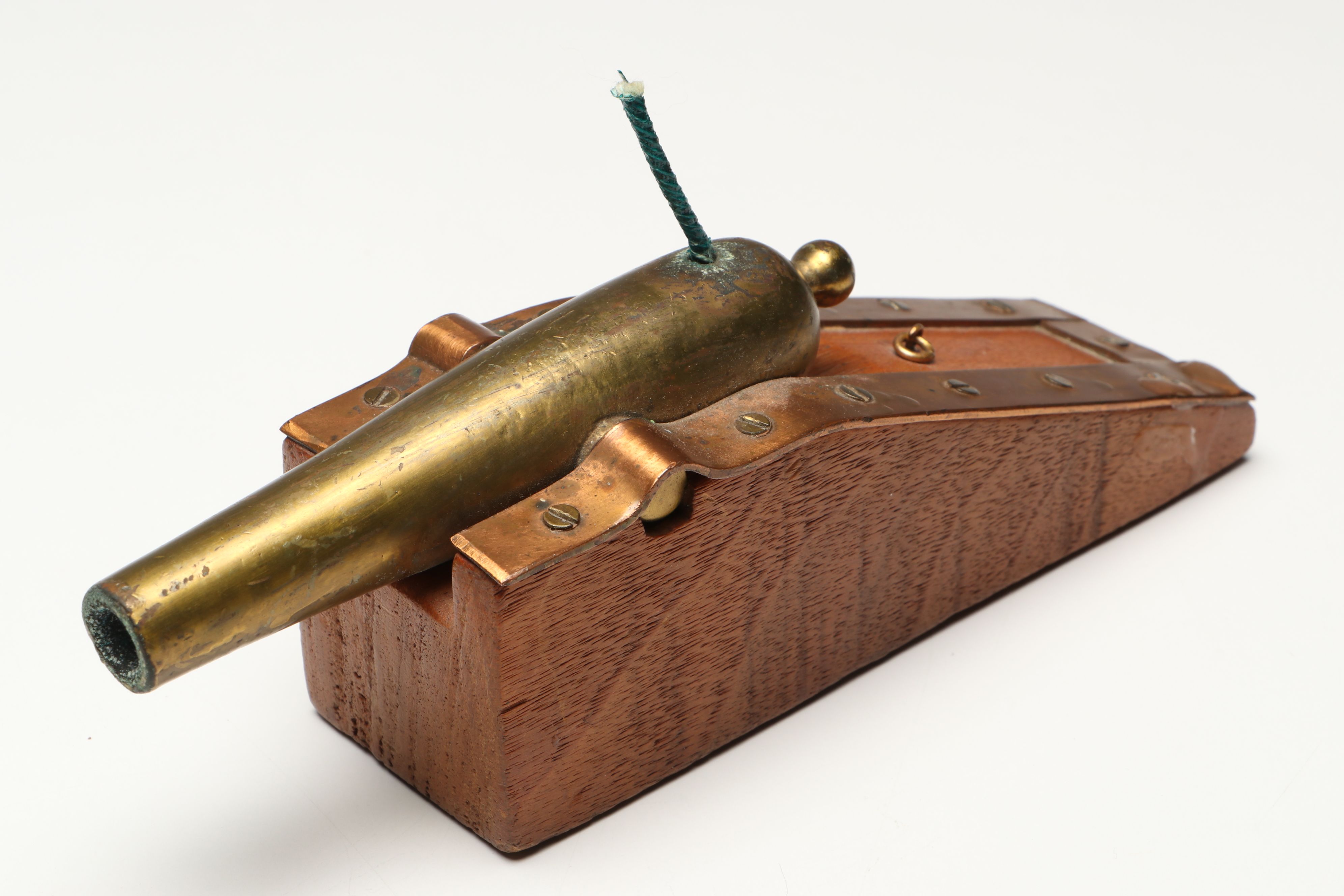 Handcrafted Metal Biplane Sculpture with Toy Cannons