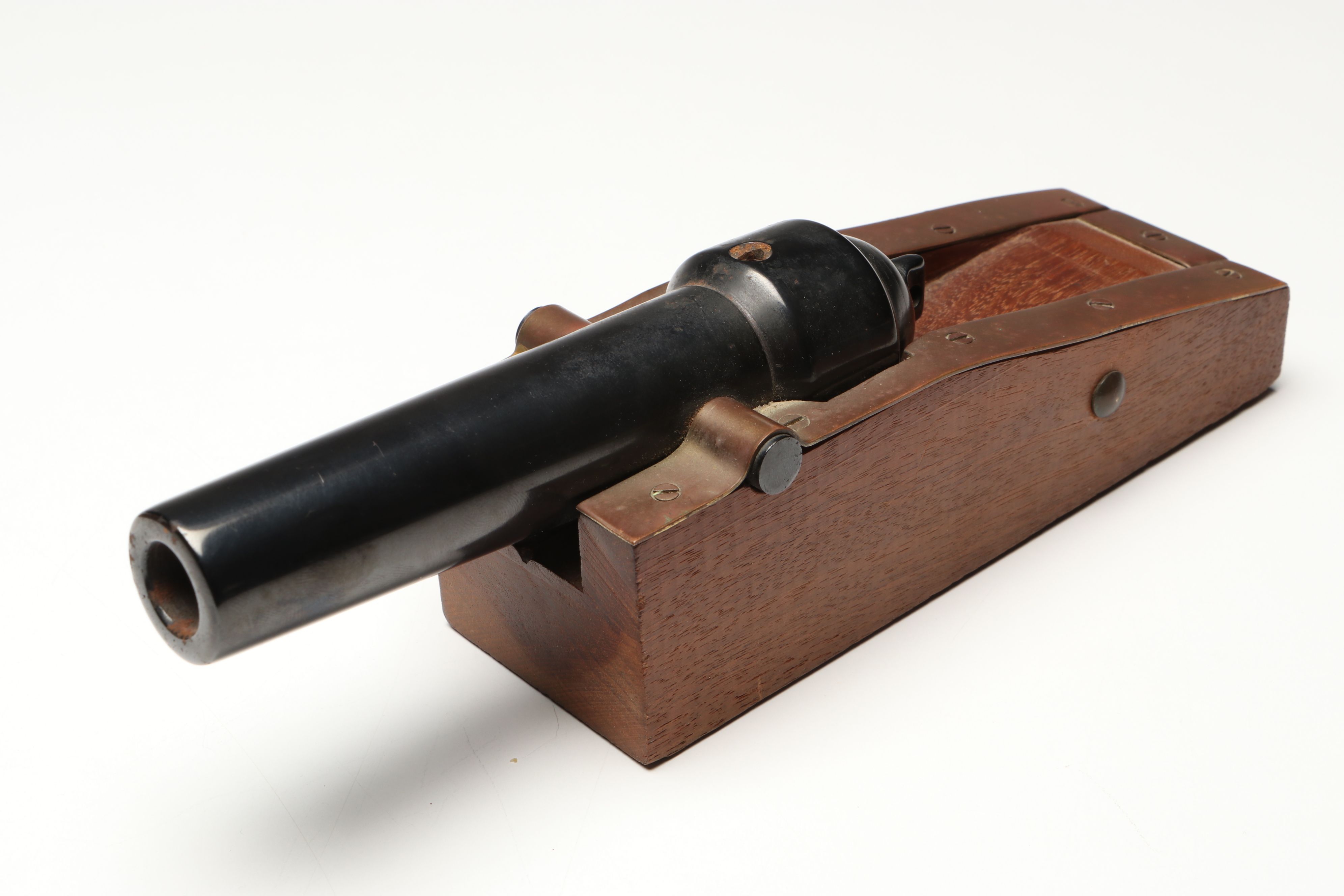 Handcrafted Metal Biplane Sculpture with Toy Cannons