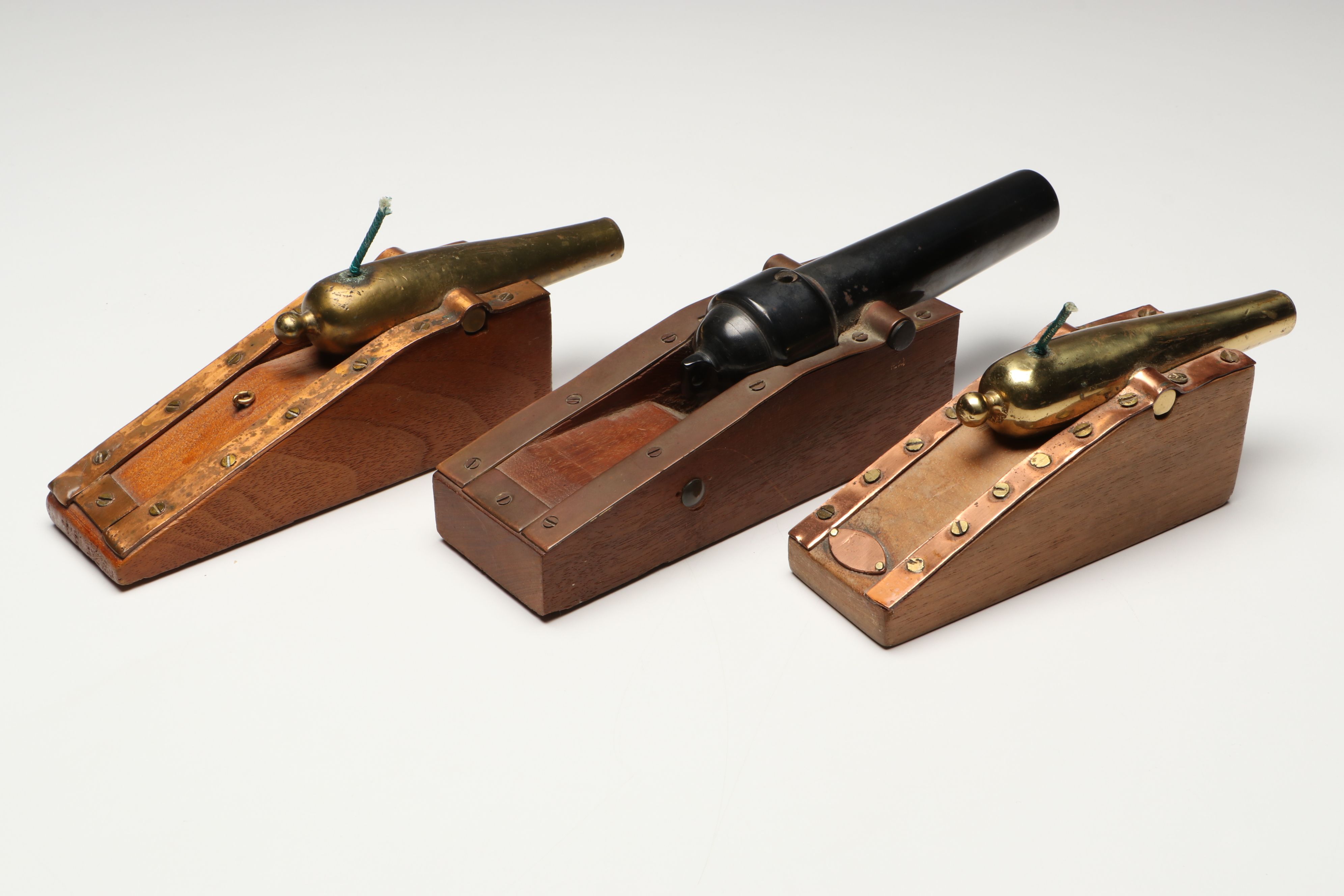 Handcrafted Metal Biplane Sculpture with Toy Cannons