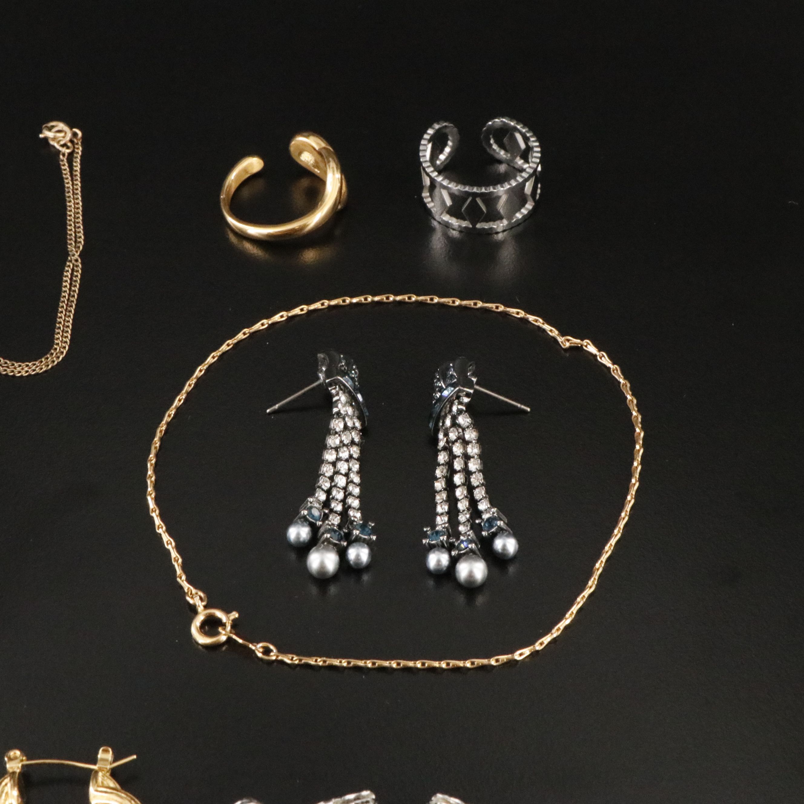 Fleur-de-Lis, Tassel Necklace and Faux Pearl Featured in Jewelry Assortment