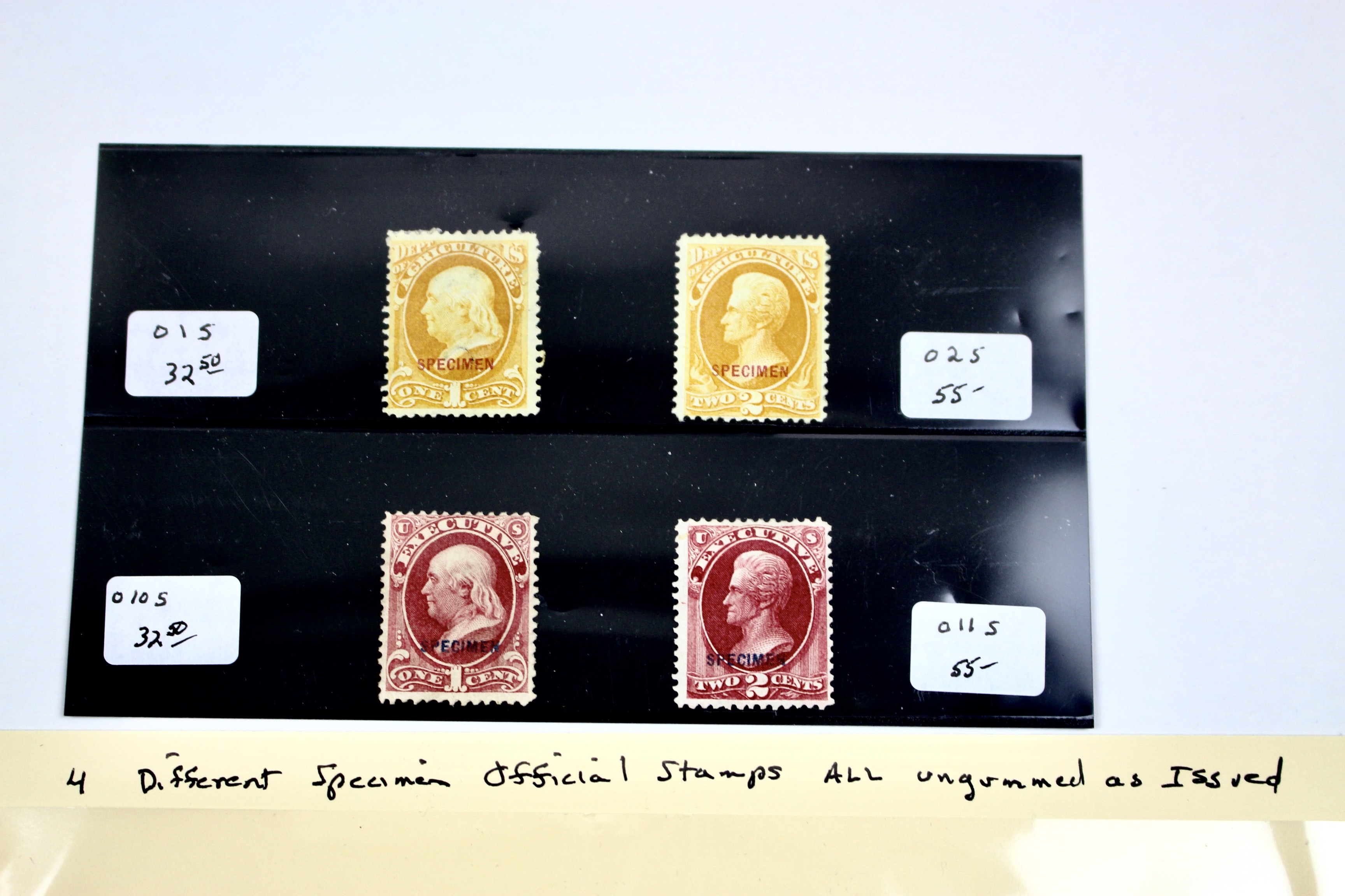 Four Different Specimen Official U.S. Stamps