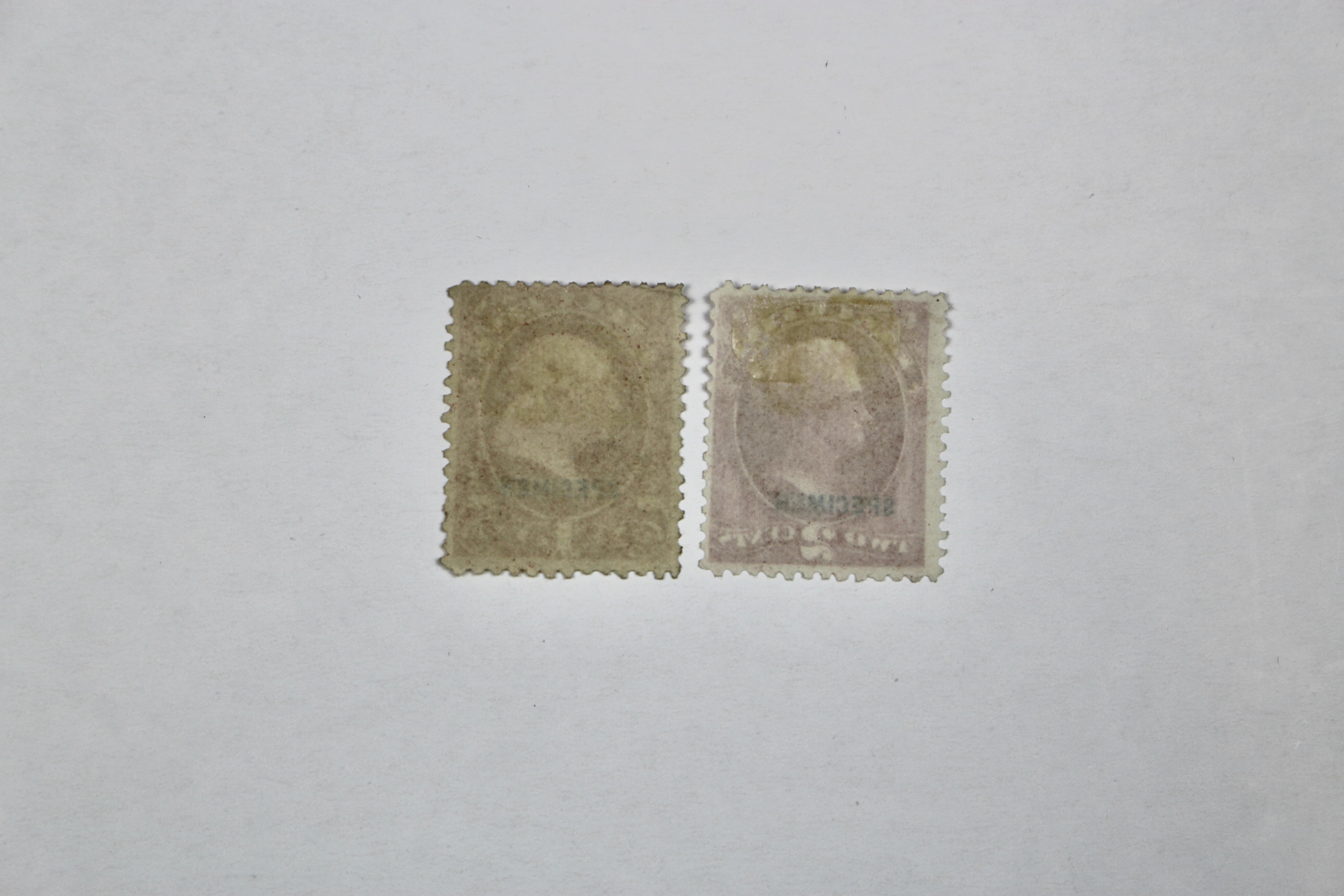 Four Different Specimen Official U.S. Stamps