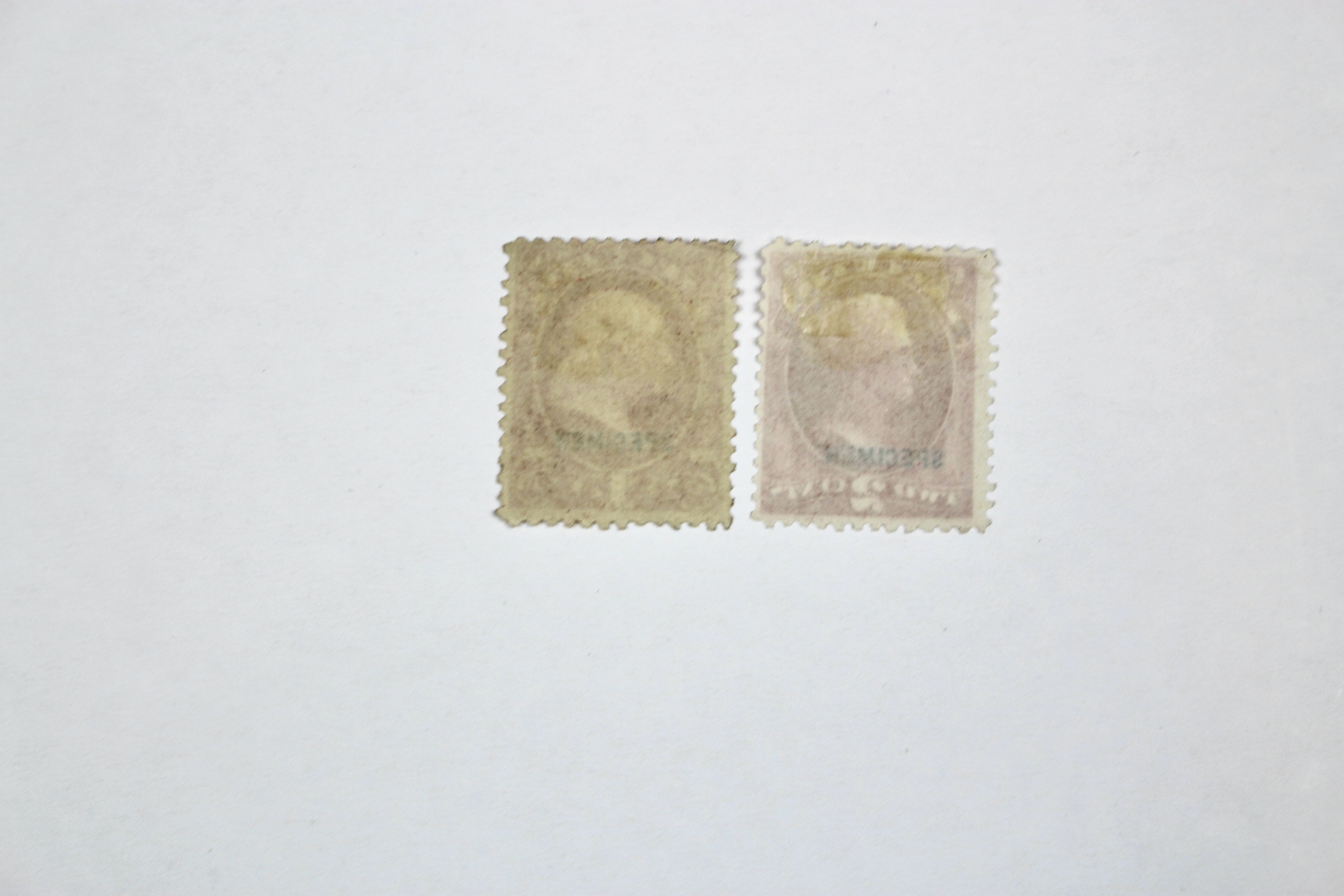 Four Different Specimen Official U.S. Stamps