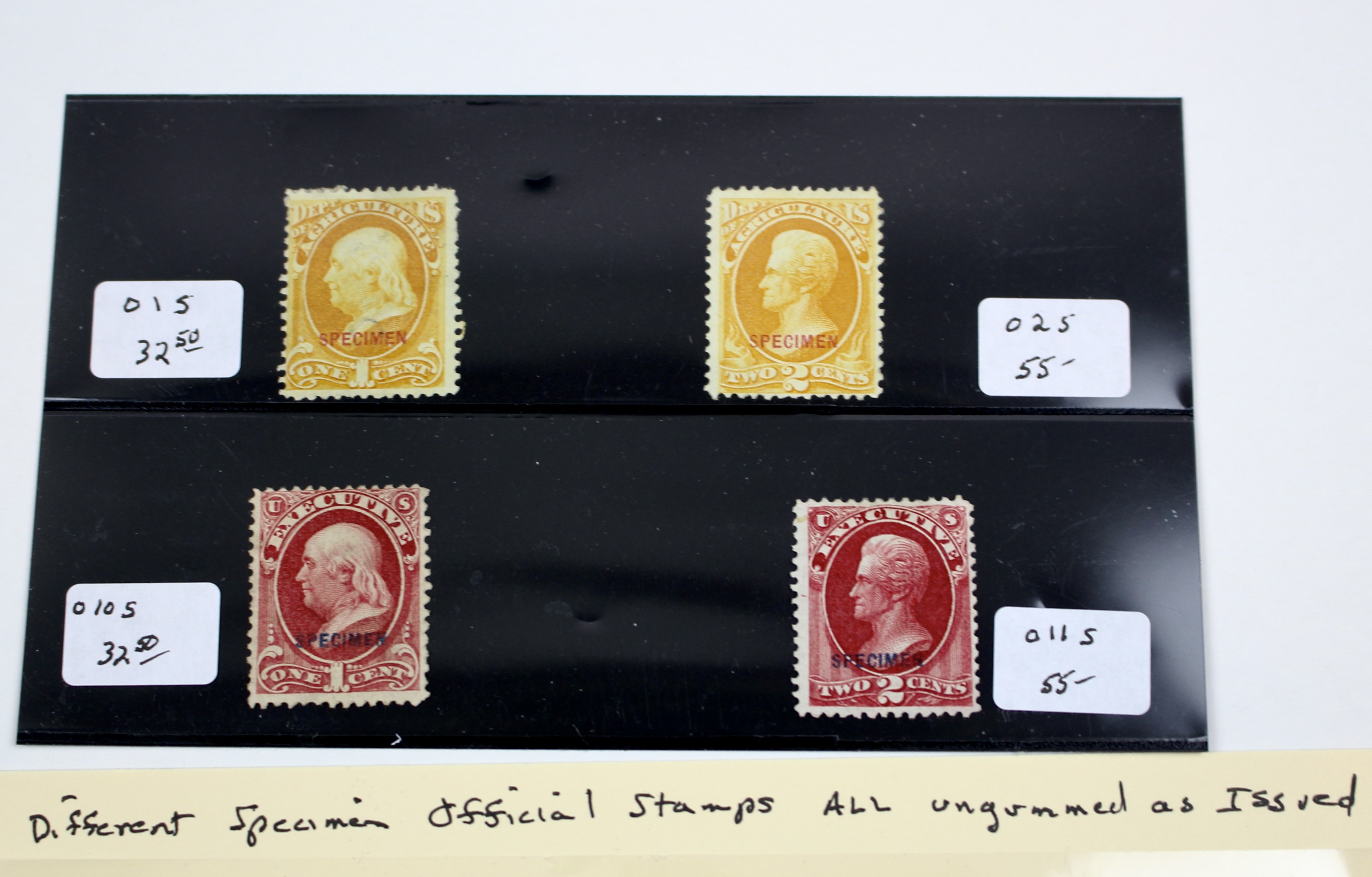 Four Different Specimen Official U.S. Stamps