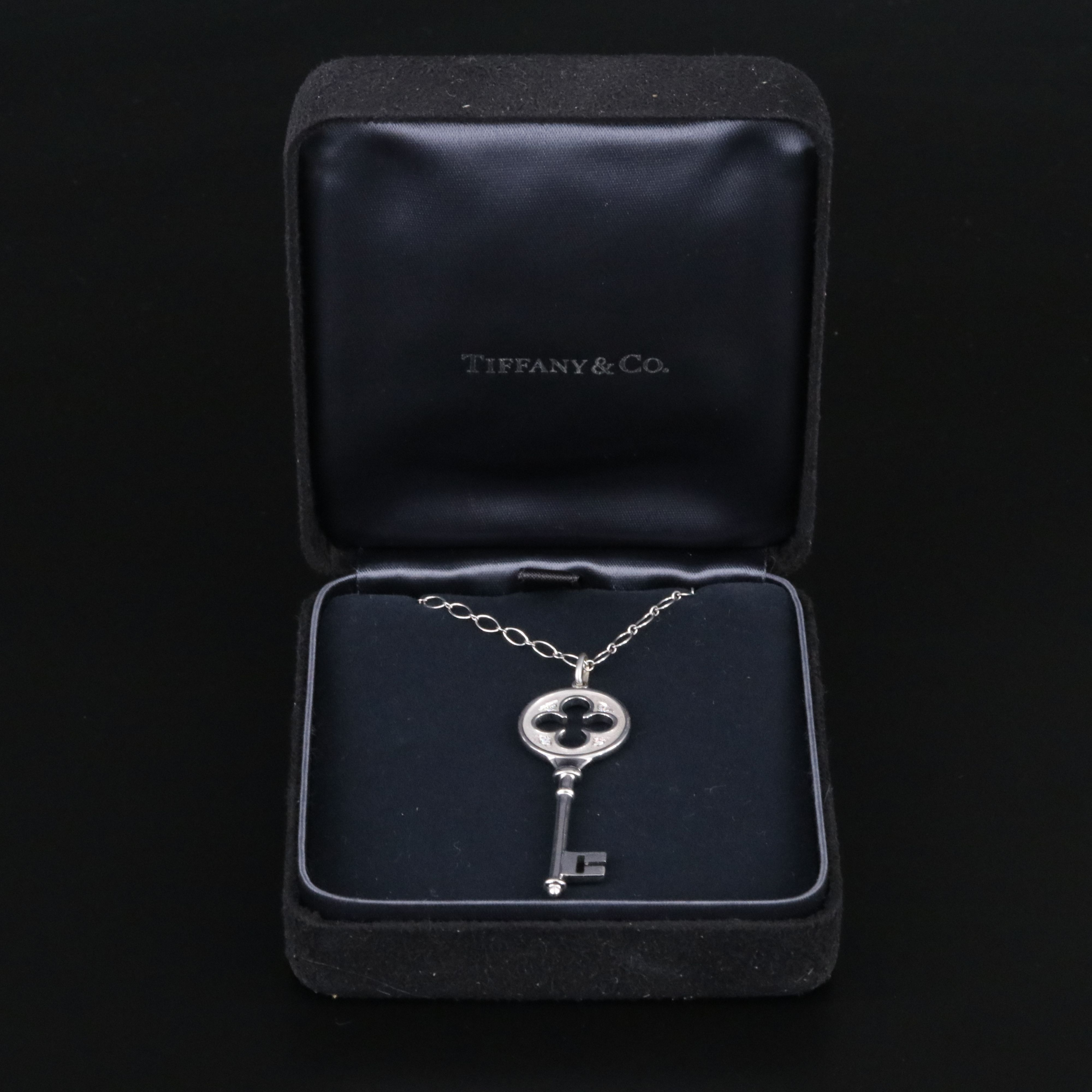 Tiffany & Co. Keys 18K Diamond Quatrefoil Key Pendant Necklace
