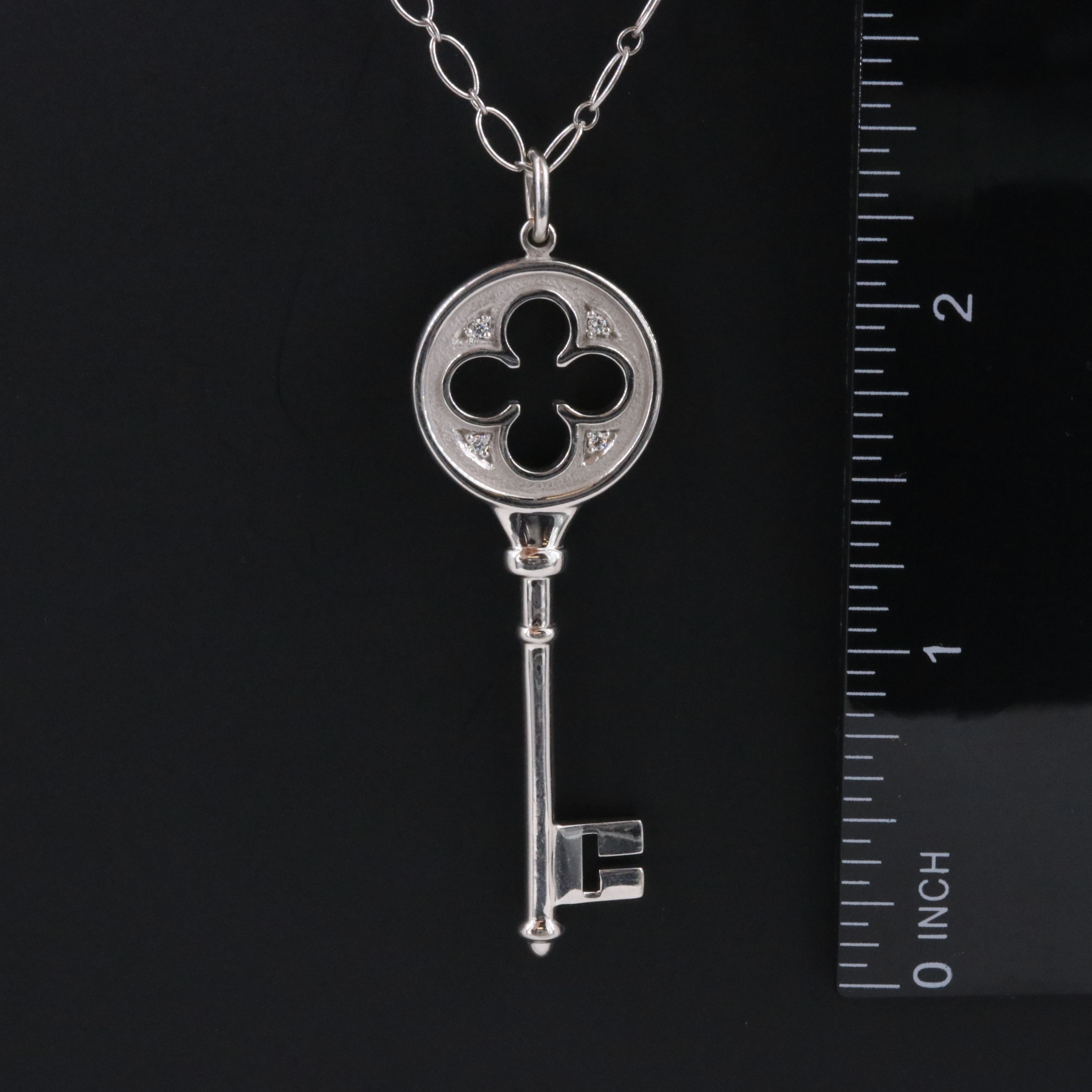 Tiffany & Co. Keys 18K Diamond Quatrefoil Key Pendant Necklace
