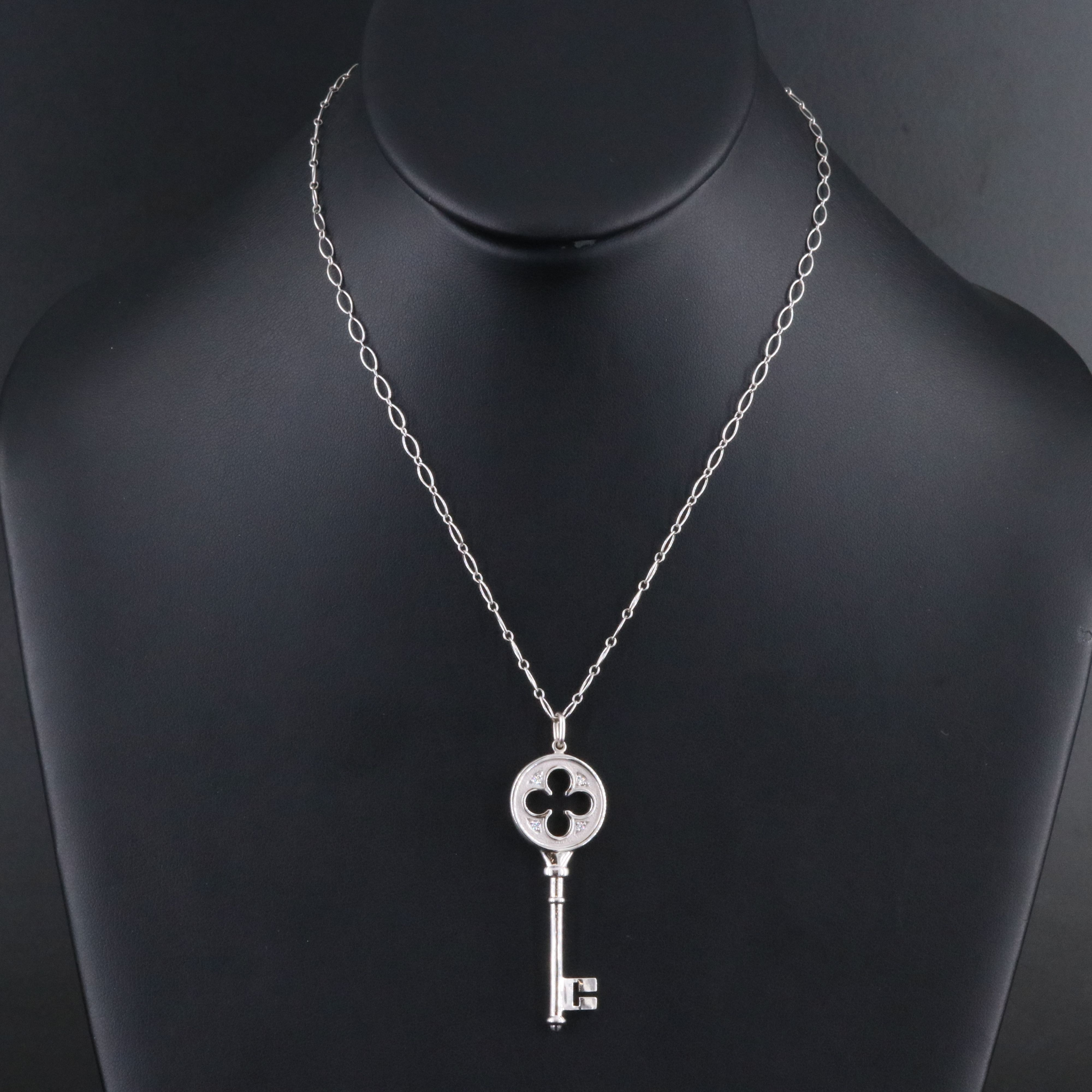 Tiffany & Co. Keys 18K Diamond Quatrefoil Key Pendant Necklace