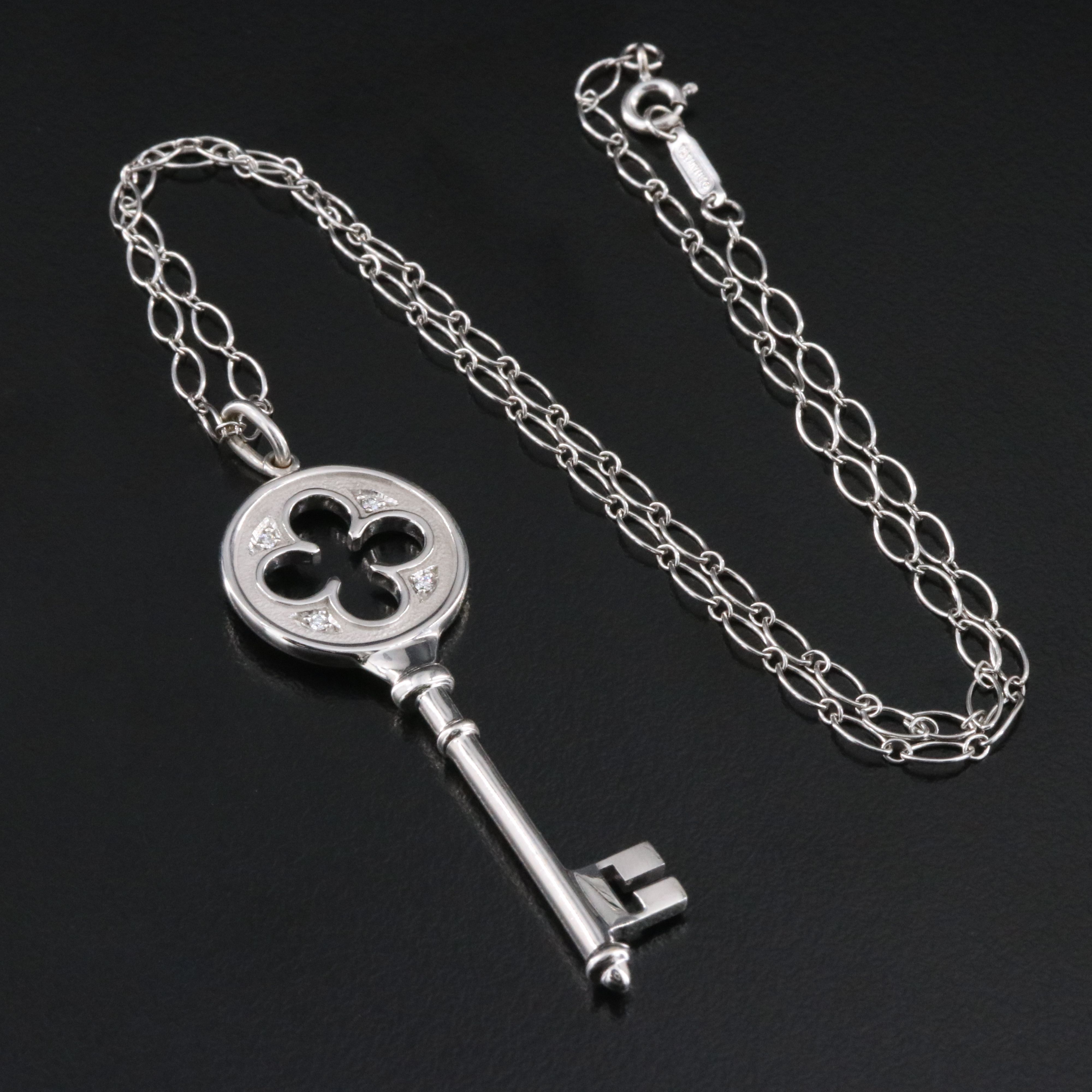 Tiffany & Co. Keys 18K Diamond Quatrefoil Key Pendant Necklace