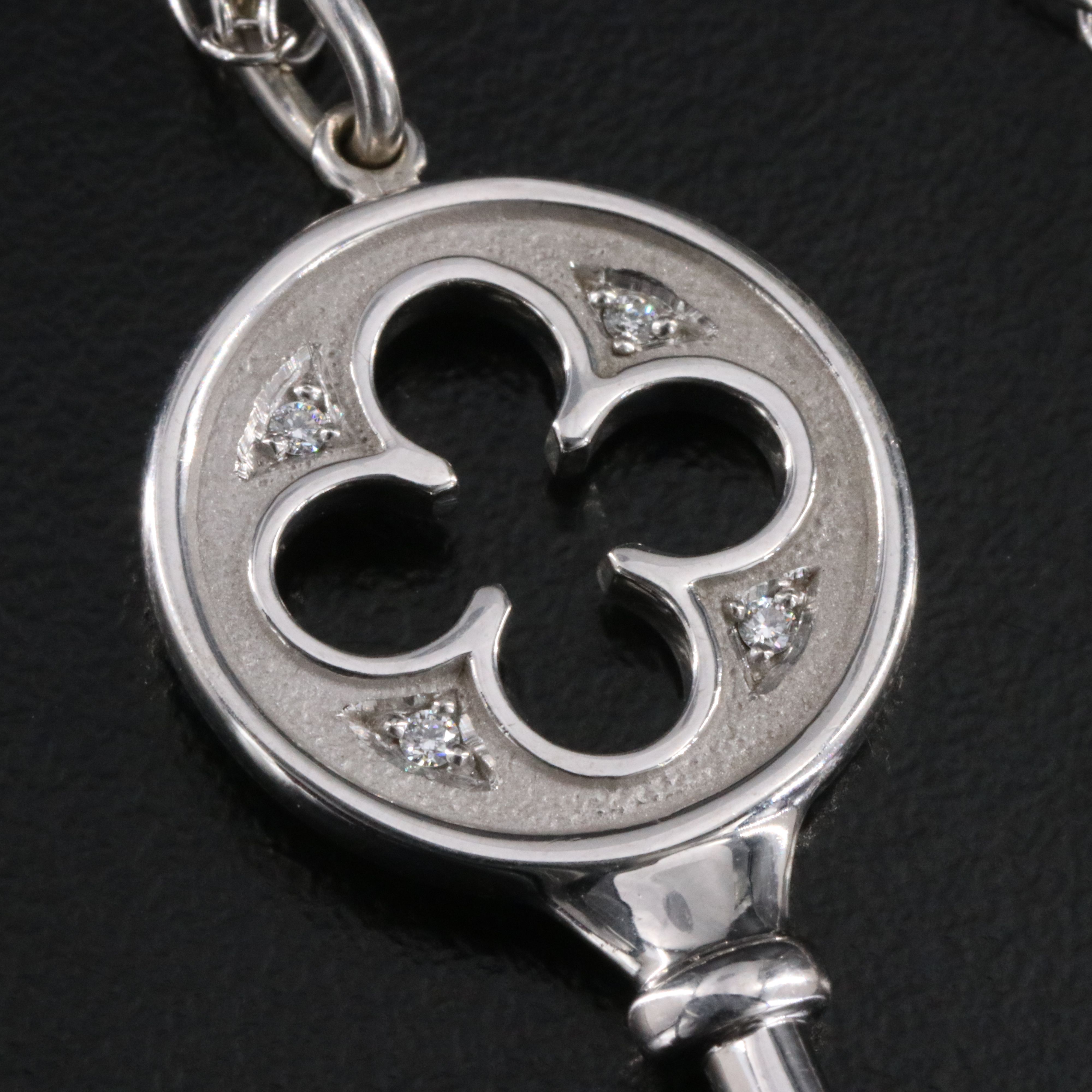 Tiffany & Co. Keys 18K Diamond Quatrefoil Key Pendant Necklace