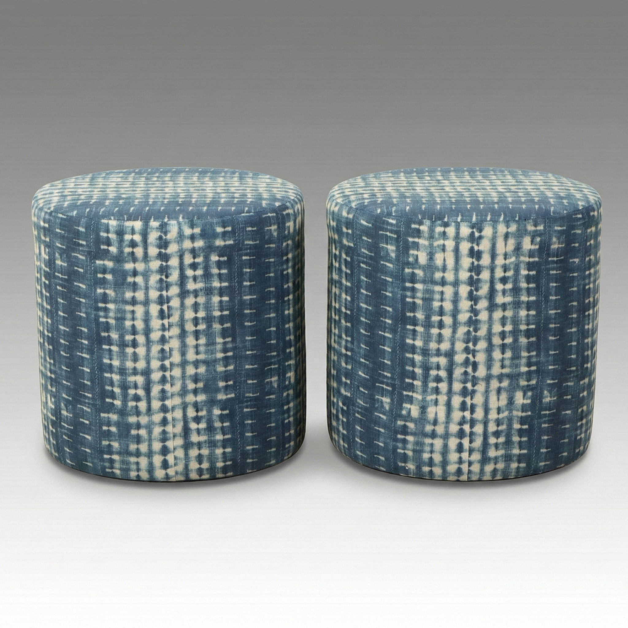 Pair of Skyline Furniture Blue Batik Upholstered Cylindrical Ottomans