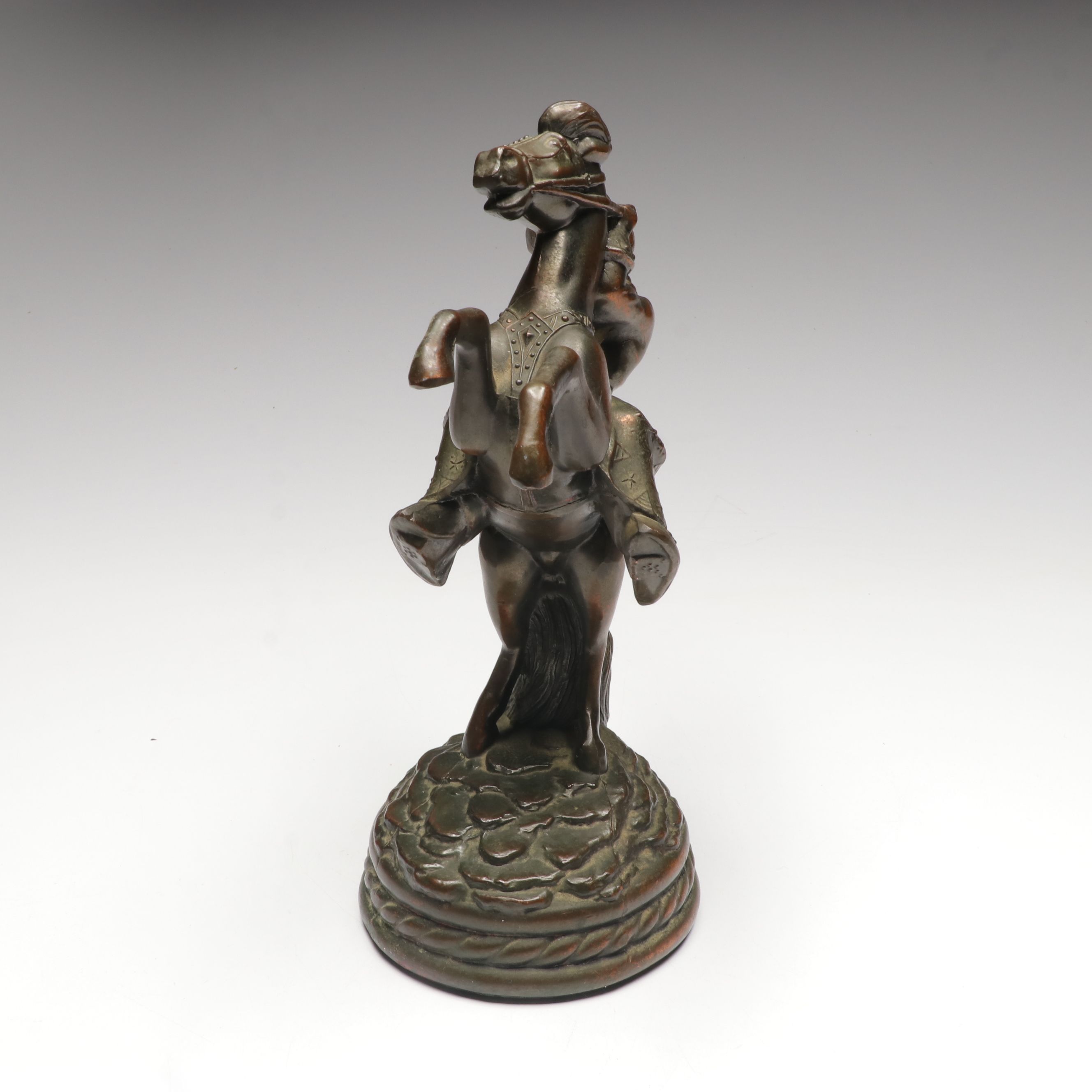 Copper Finish Cowboy on Horseback Sculpture