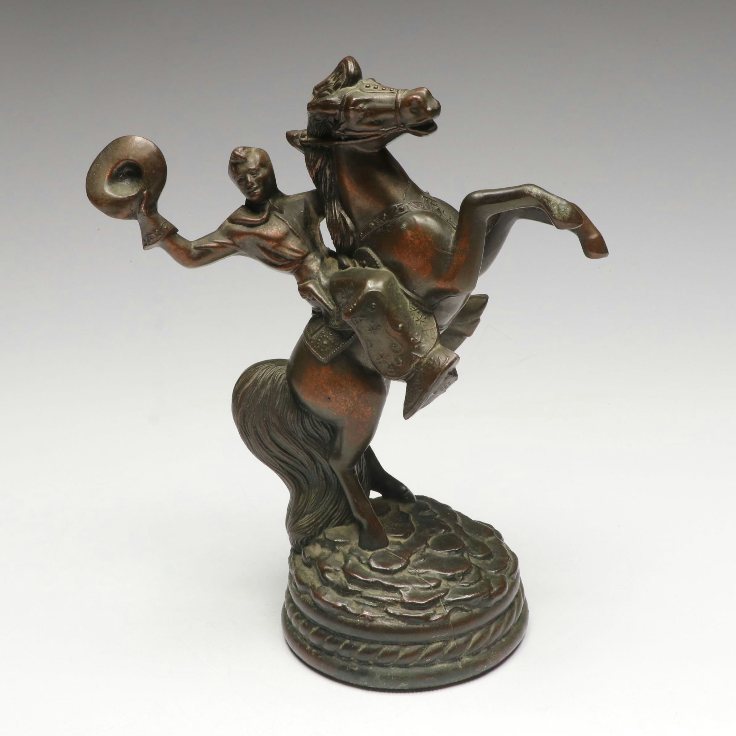 Copper Finish Cowboy on Horseback Sculpture