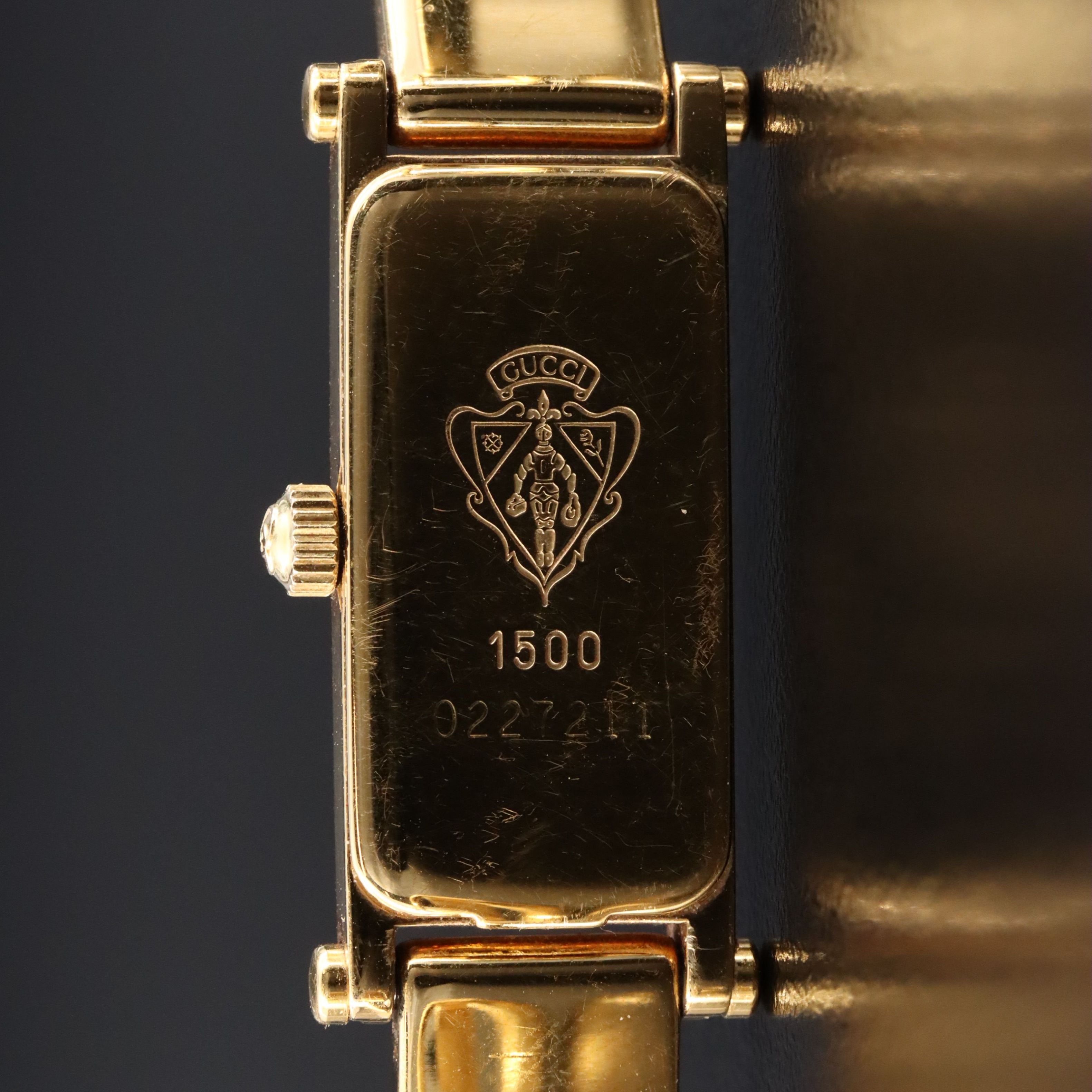 Gucci 1500L Mother-of-Pearl Dial Watch with Gold-Tone Bangle Bracelet