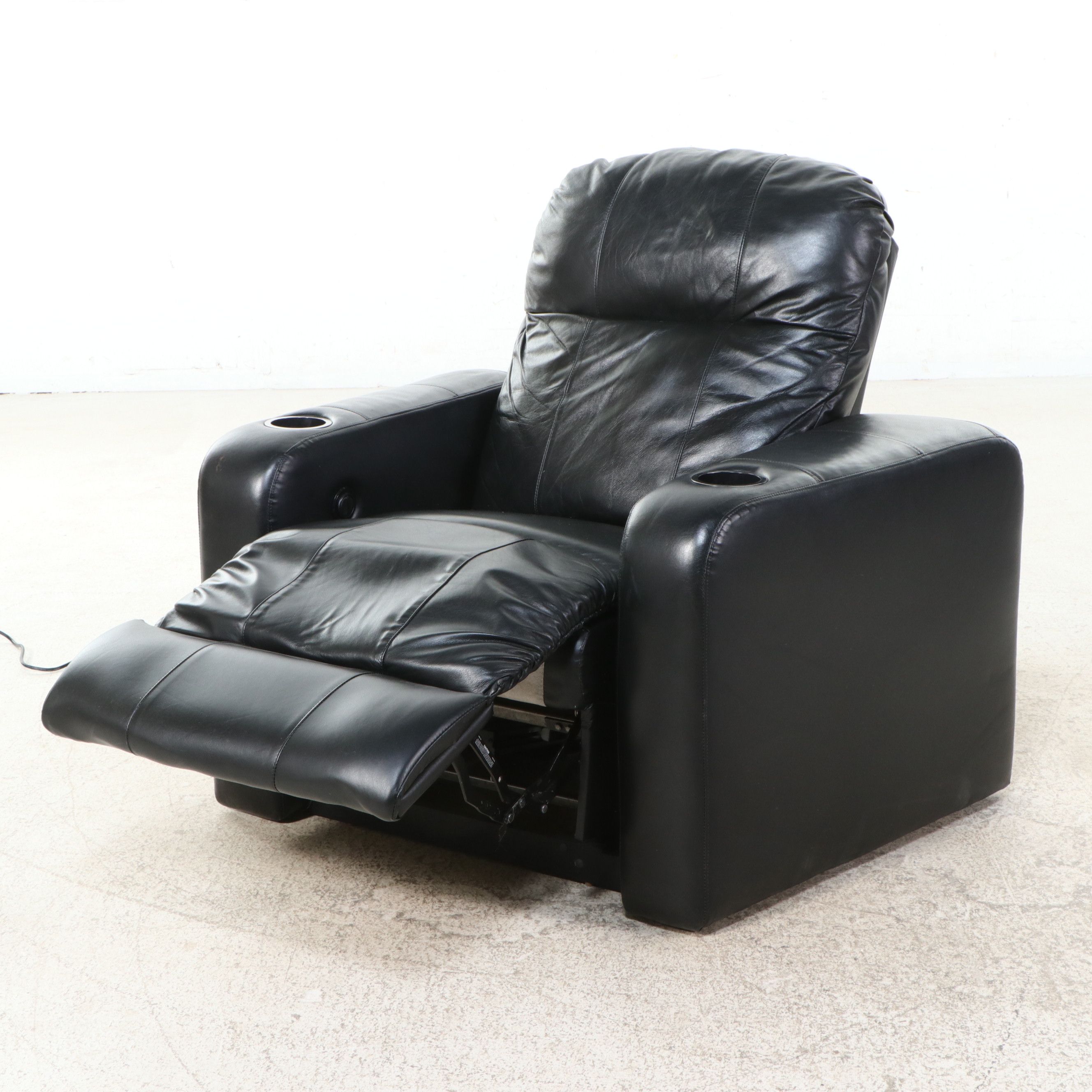 Black Leather Four-Piece Power Reclining Home Theater Seating Suite