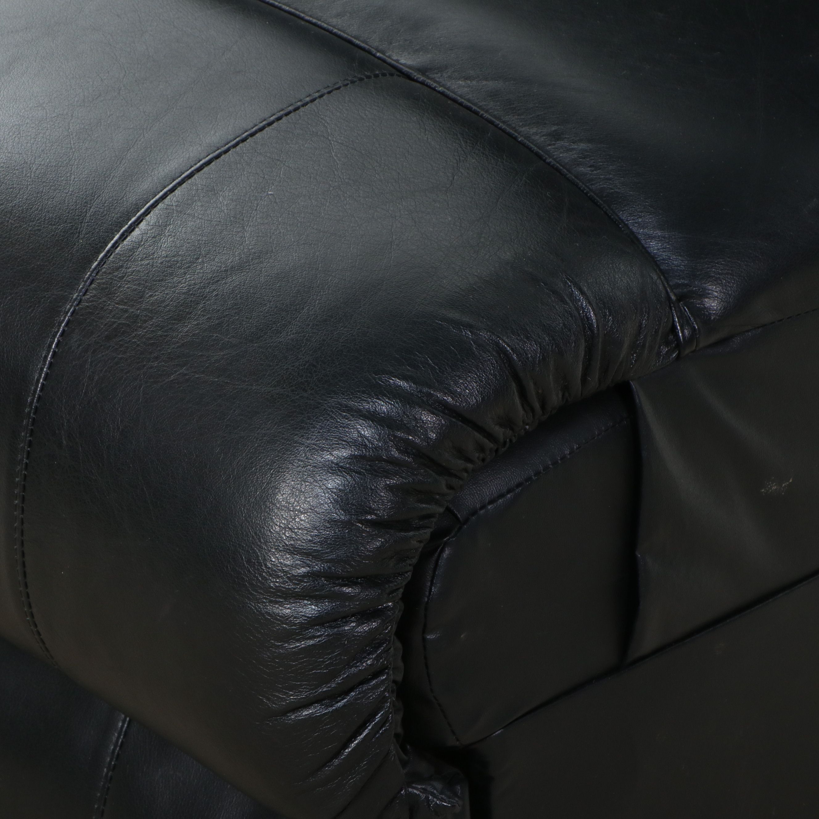 Black Leather Four-Piece Power Reclining Home Theater Seating Suite